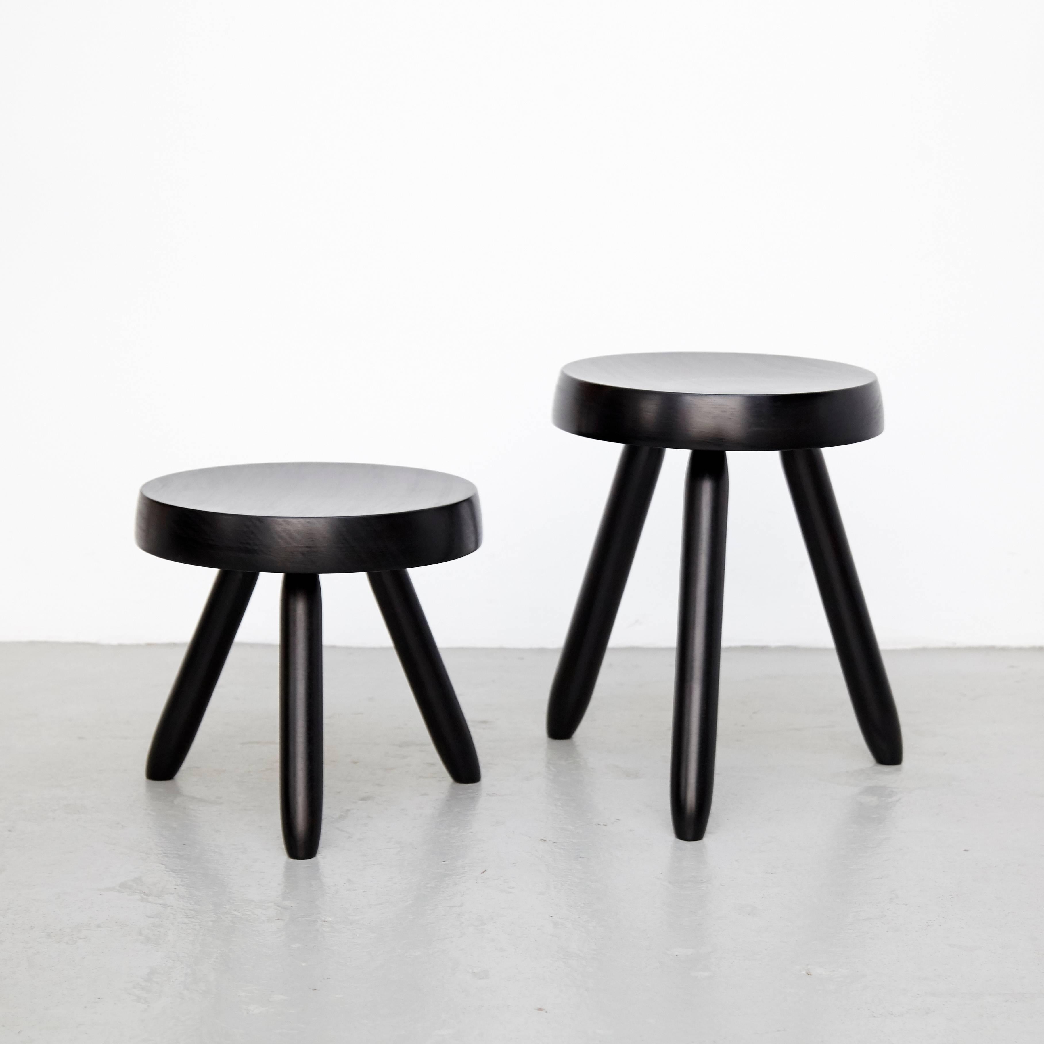 Set of three stools designed in the style of Charlotte Perriand.
Made by unknown manufacturer.

In good original condition, preserving a beautiful patina, with minor wear consistent with age and use. 

Charlotte Perriand (1903-1999) She was