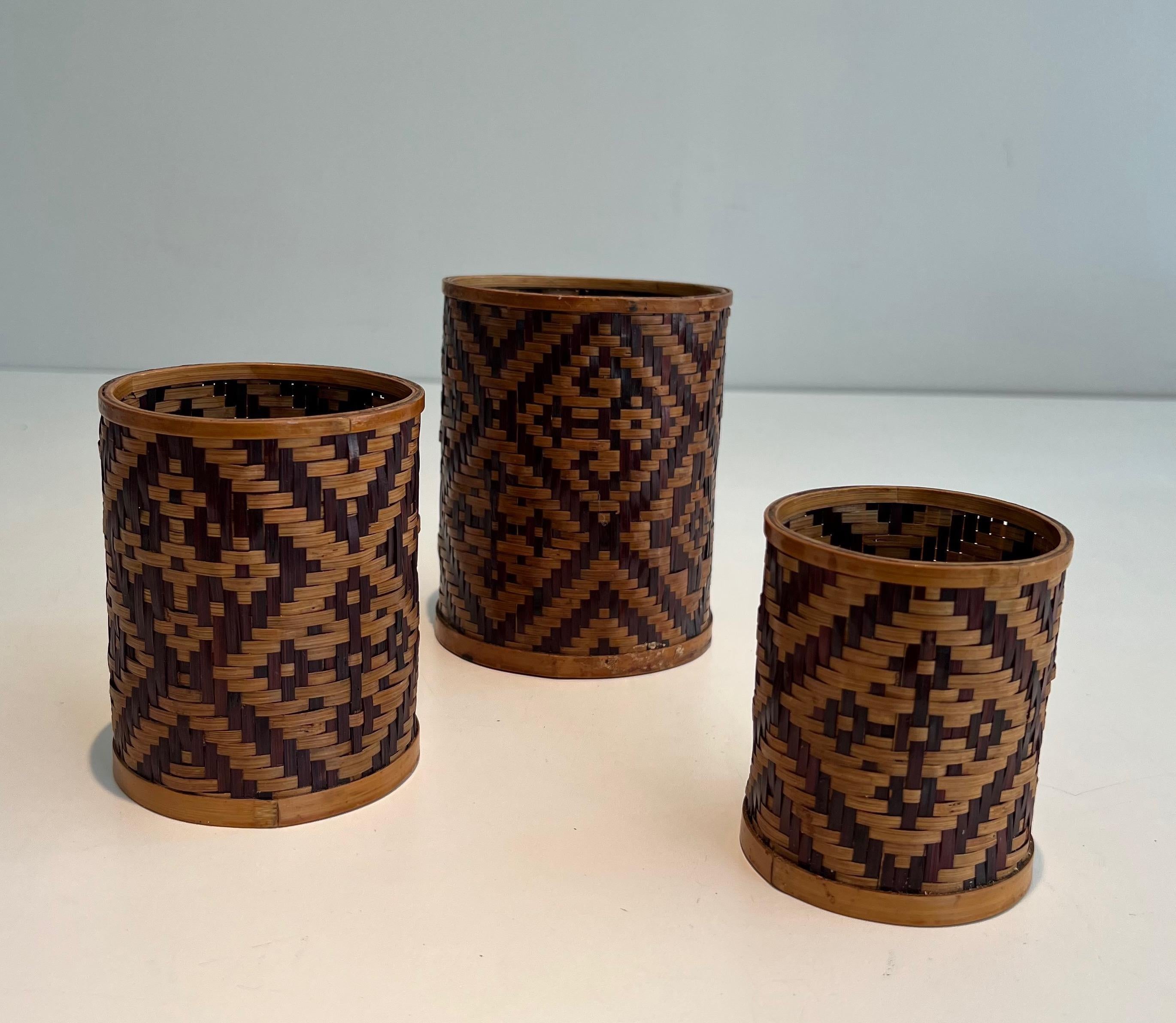 This set of 3 marquetry pen pots is made of straw. Pots can fit into each other. This is a French work. Circa 1930