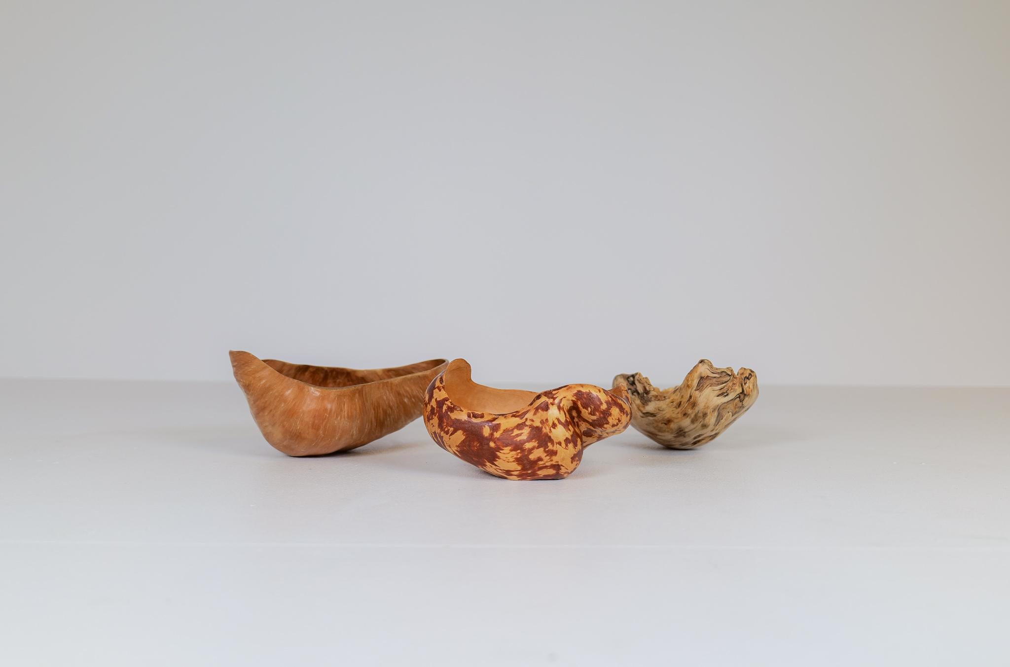 These burl bowls made in Sweden with precision handcraft gives a nice edition to any living room with intention to give an organic simple, but jet complex look. The signs of the wood structure and life are clearly visible. 

Good vintage