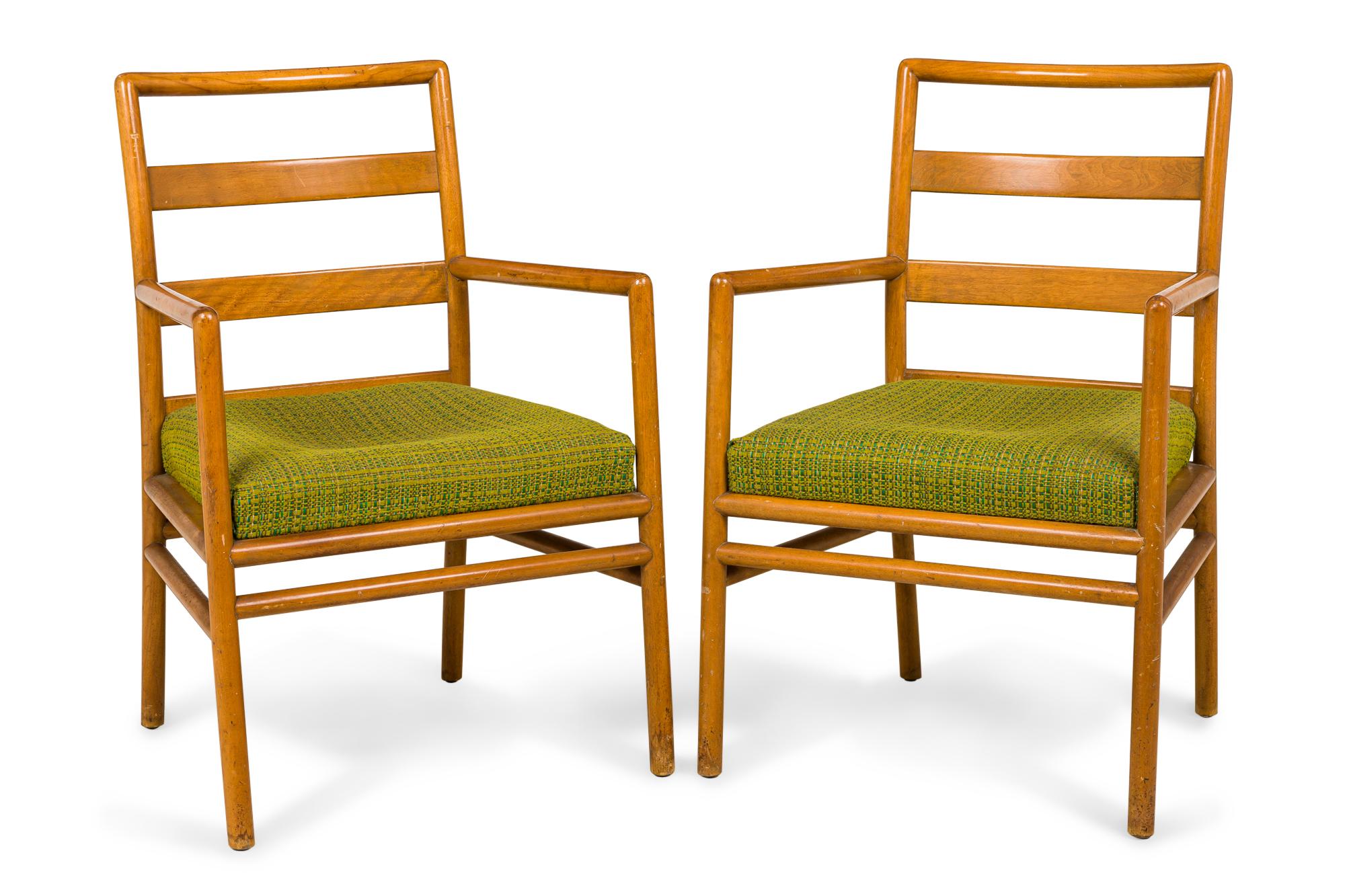 SET of 3 Mid-Century dining side chairs consisting of two armchairs and one side chair with light wooden frames, woven green fabric seats, and ladder backs, resting on four dowel legs with stretchers. (T.H. ROBSJOHN-GIBBINGS FOR WIDDICOMB FURNITURE