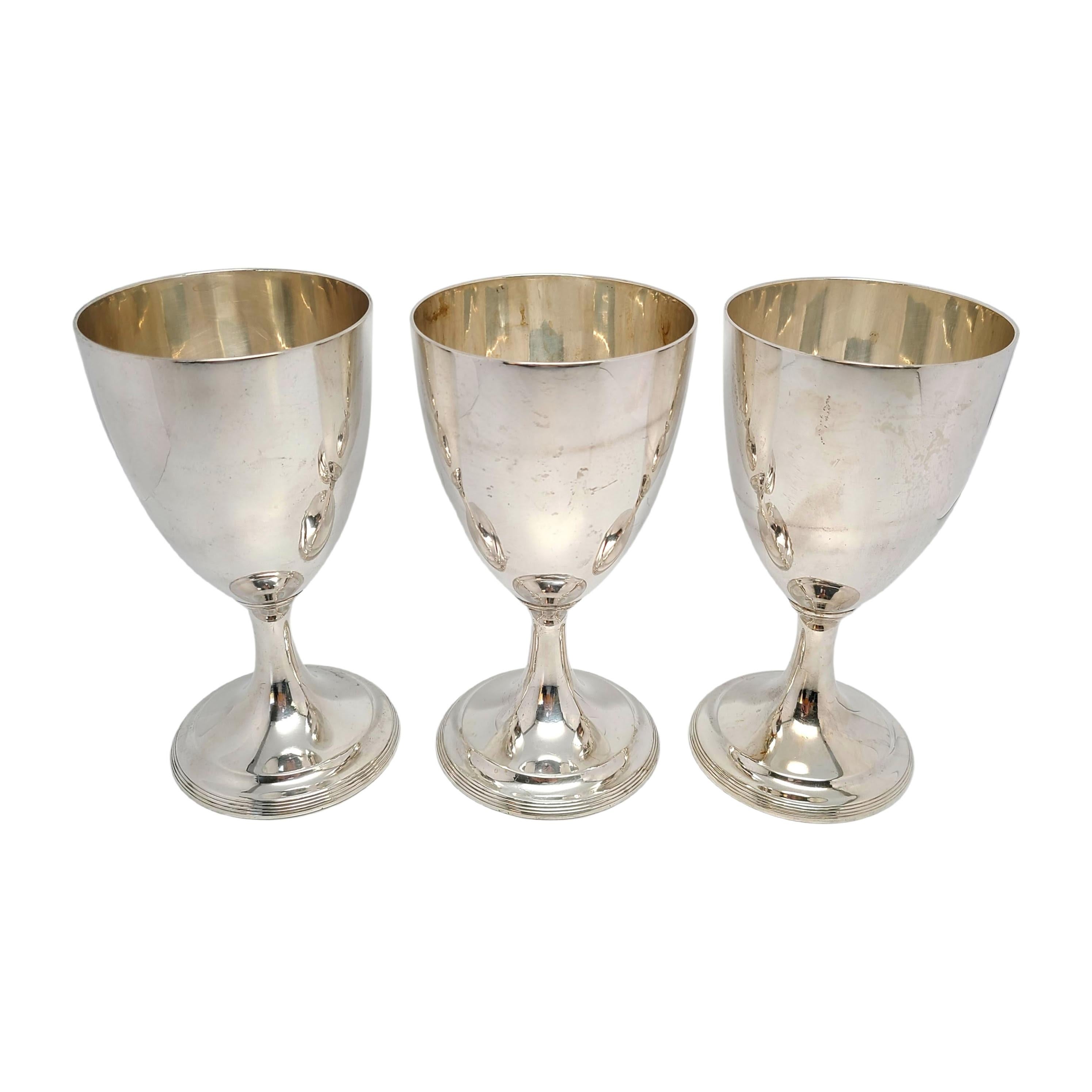 Set of 3 antique Tiffany & Co sterling silver Robert Salmon reproduction goblets, c.1913.

No monogram or engraving.

3 goblet style cups features an ovoid bowl with a a highly polished finish and ribbed edge foot. Hallmarks date this piece to