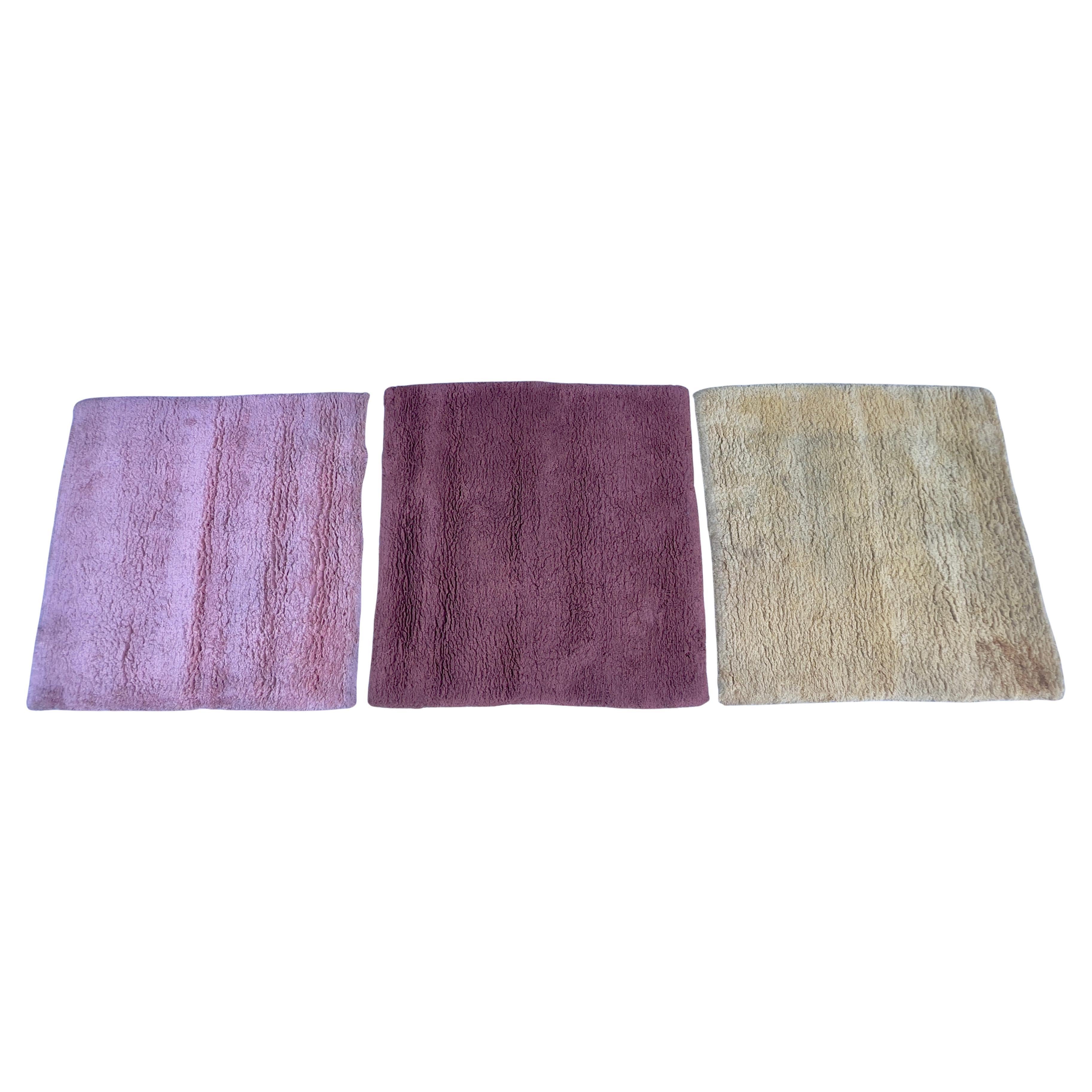 A collection of three  square carpets produced in France for Italian textile company Tisca. HAND tufted , pure wool fibers.Great colors,, Priced separately .. pick color when purchasing.. or simply buy them all . Rugs measure 69