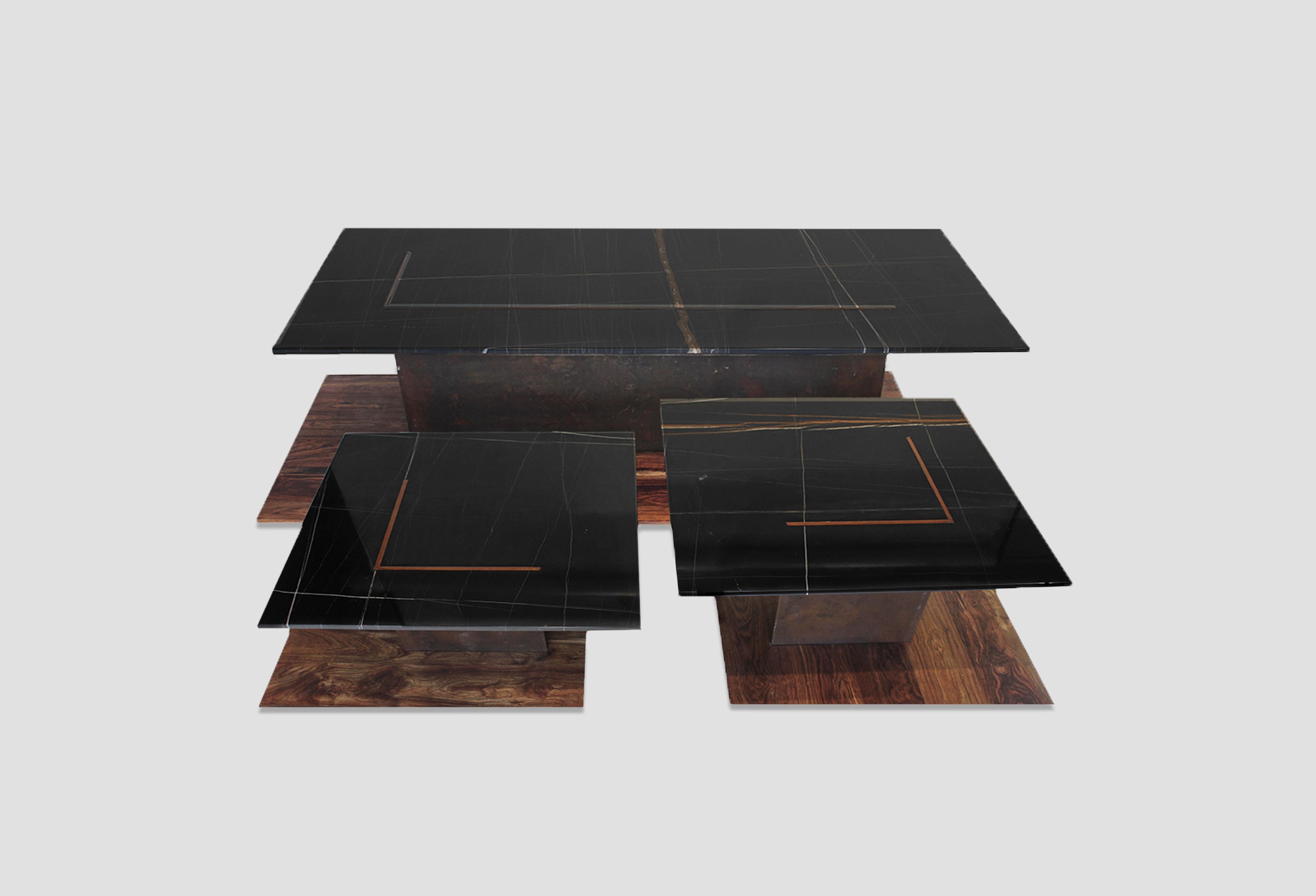 Set of 3 Tres tables by Andrea Cesarman
Dimensions: D 152 x W 152 x H 40 cm
Materials: Chechen wood, oxidized steel, Black Sahara marble

Coffee tables made in Chechen, oxidized steel and Black Sahara marble.

Andrea Cesarman is an interior