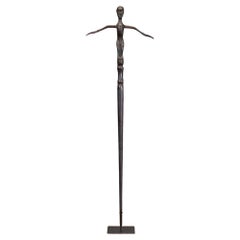 Set of 3 Tribal Wooden Fetish Figures – Borneo Ritual Sculptures on Museum Stand