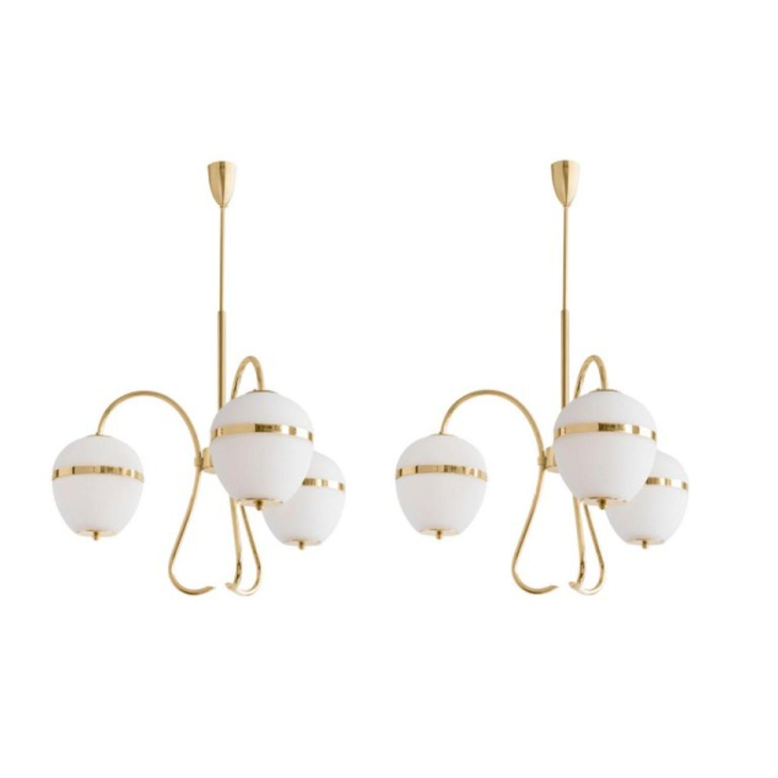 Triple chandelier China 02 by Magic Circus Editions
Dimensions: H 120 x W 80.3 x D 25 cm
Materials: Brass, mouth blown glass sculpted with a diamond saw
Colour: soft rose

Available finishes: Brass, nickel
Available colours: enamel soft white,