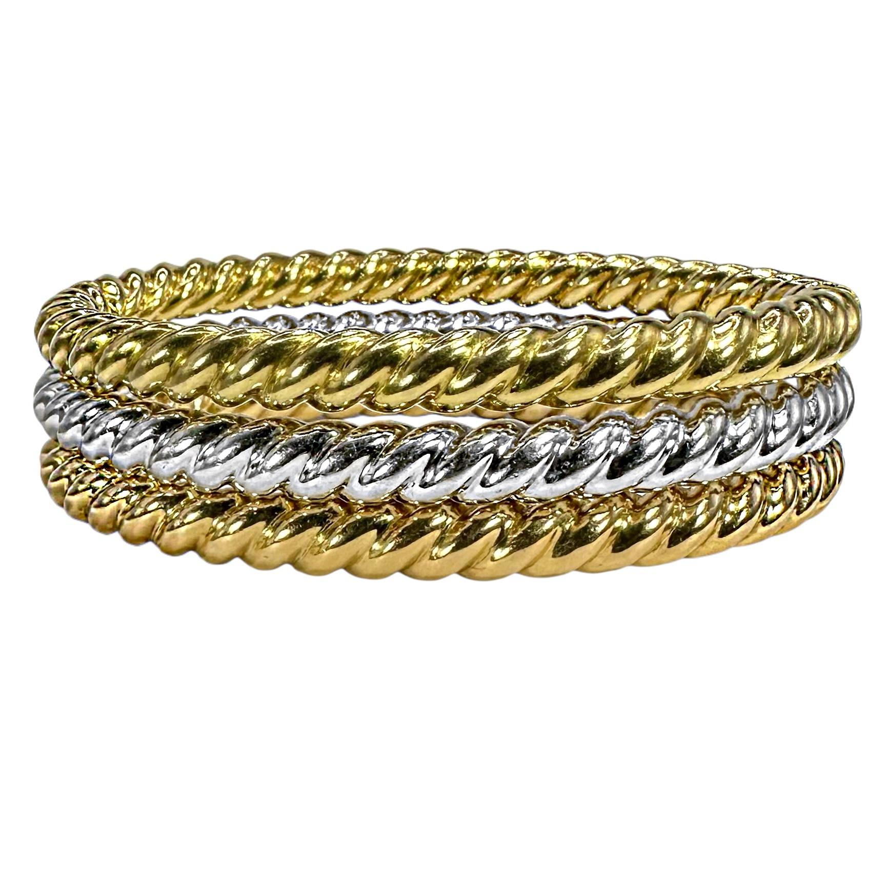 This beautifully crafted 18K gold, oval bangle bracelet set, possesses the fine quality that one would expect to find in vintage, Italian gold jewelry. This set is perfect to be worn together, or in any combination from one to all three bangles.