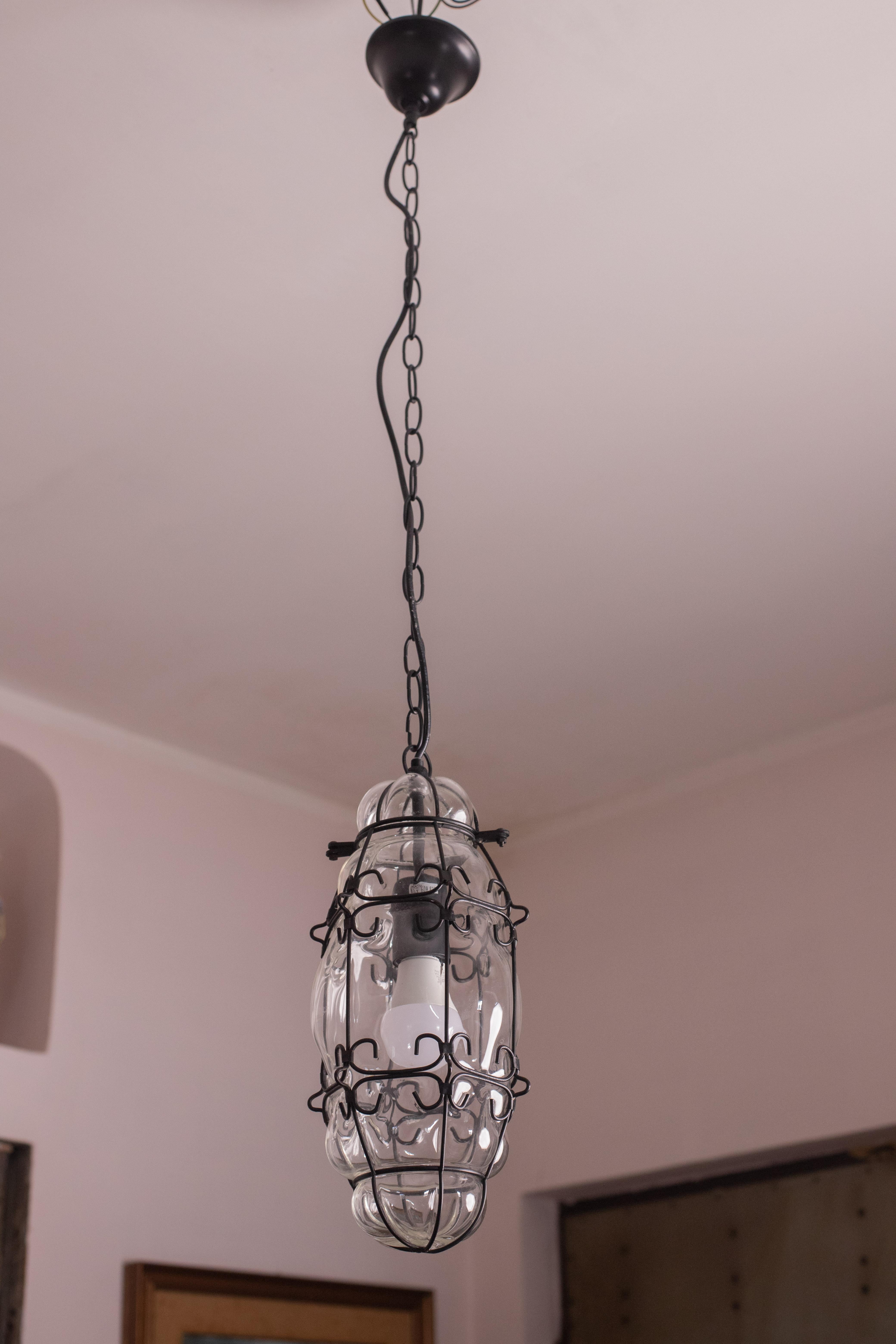 Three beautiful lights for hallways, entrances and living rooms.
As always, these beautiful lanterns create their own magic and show incredible craftsmanship.

The lantern is composed of mesh patterned glass, blown inside a wire cage, with a