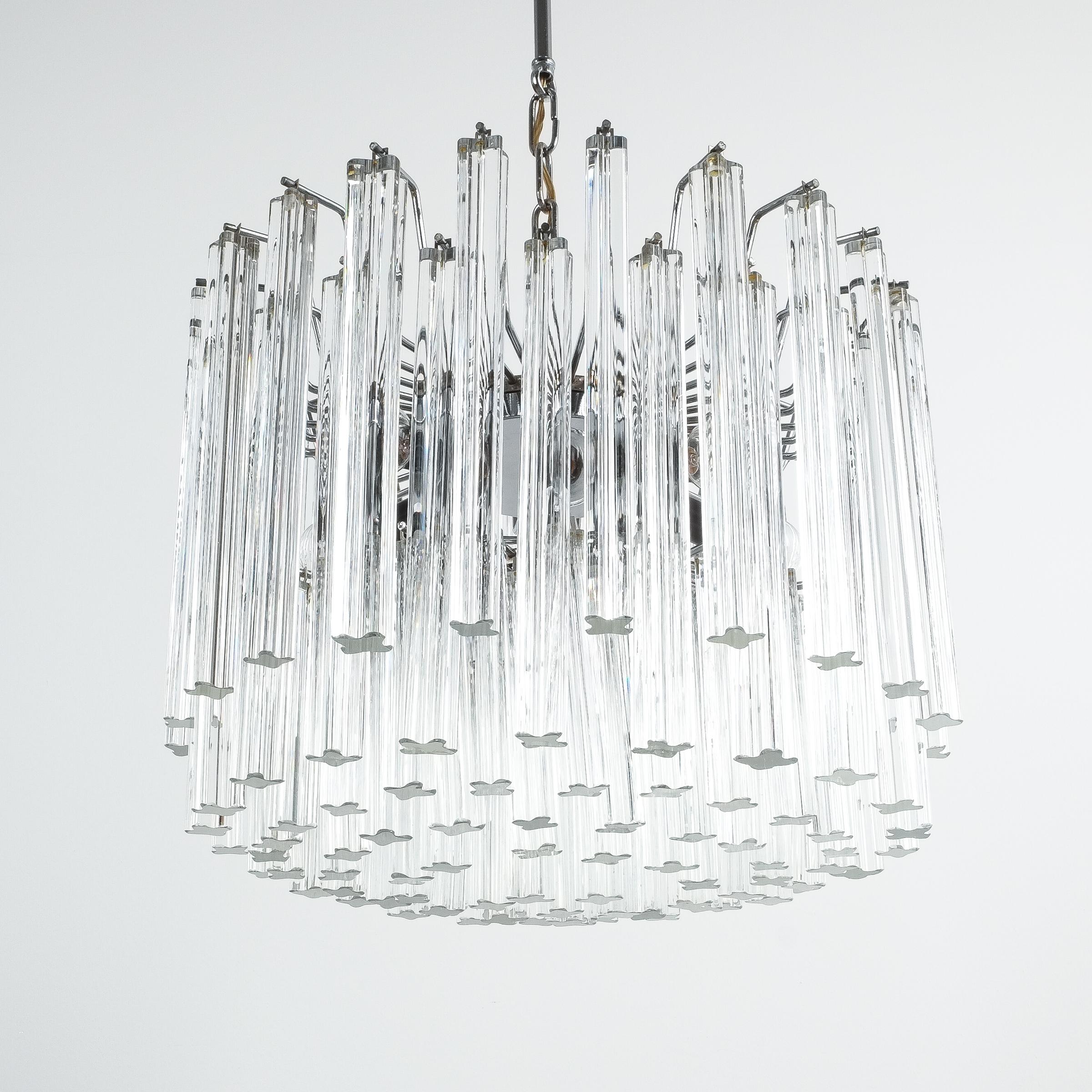 1 of 3 chandeliers comprised of a multitude of thick and smooth Murano glass bars (circa 100 glass pieces per light) priced individually. They are especially large in size measuring 19.5