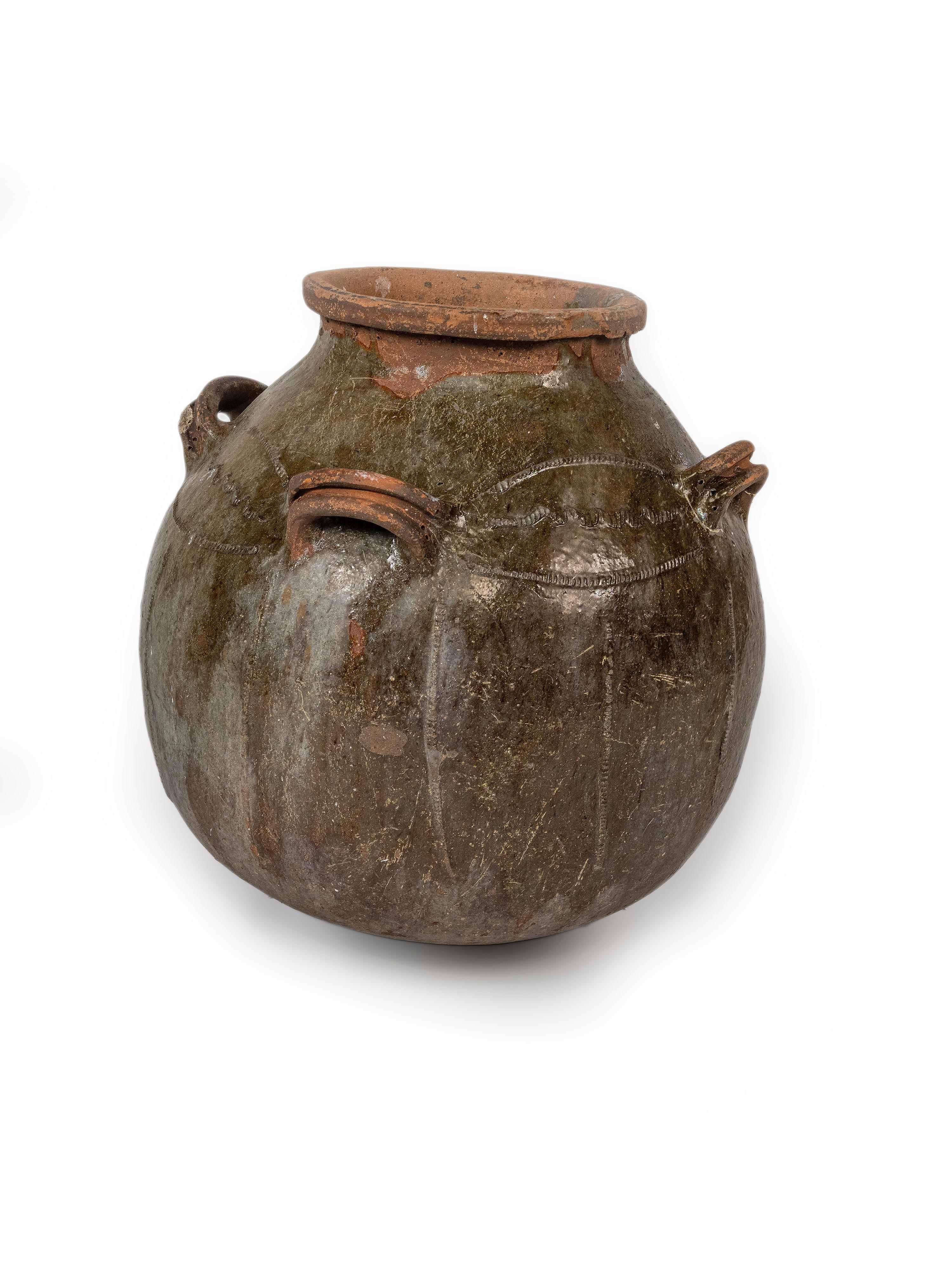 This set of three fermentation jars are from the Auvergne-Rhone-Alpes, department Puy-de-Dome. This set is nice a decorative piece for indoor use or on a terrace. These are large enough that you could you as planters. A wonderful addition to any