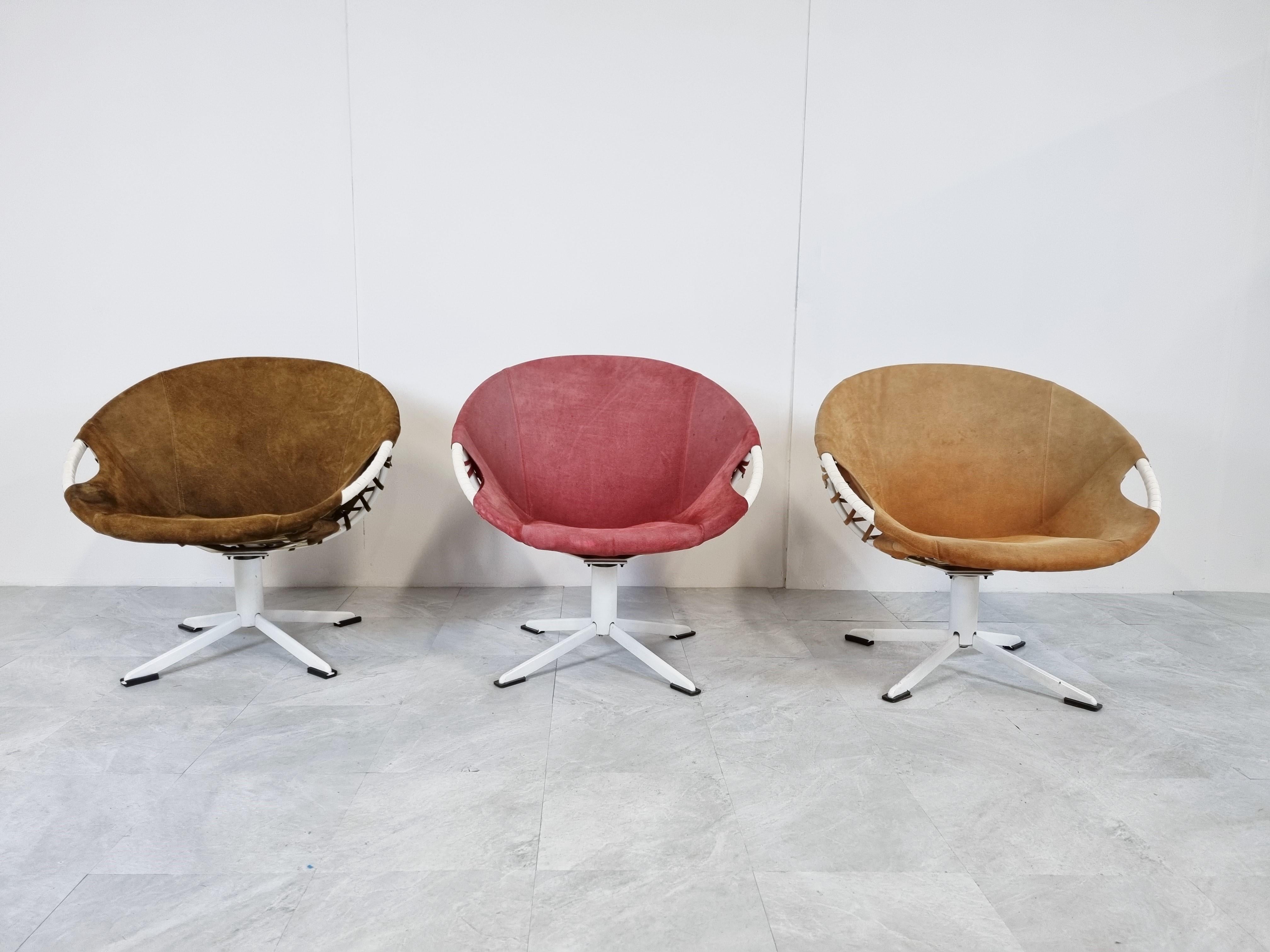 Set of 3 colourful suede swivel chairs called 'balloon' chairs Designed by Lusch Erzeugnis for Lush & Co.

The chairs have a beautiful colour and have their original upholstery.

White metal bases.

Great vintage look!

Good