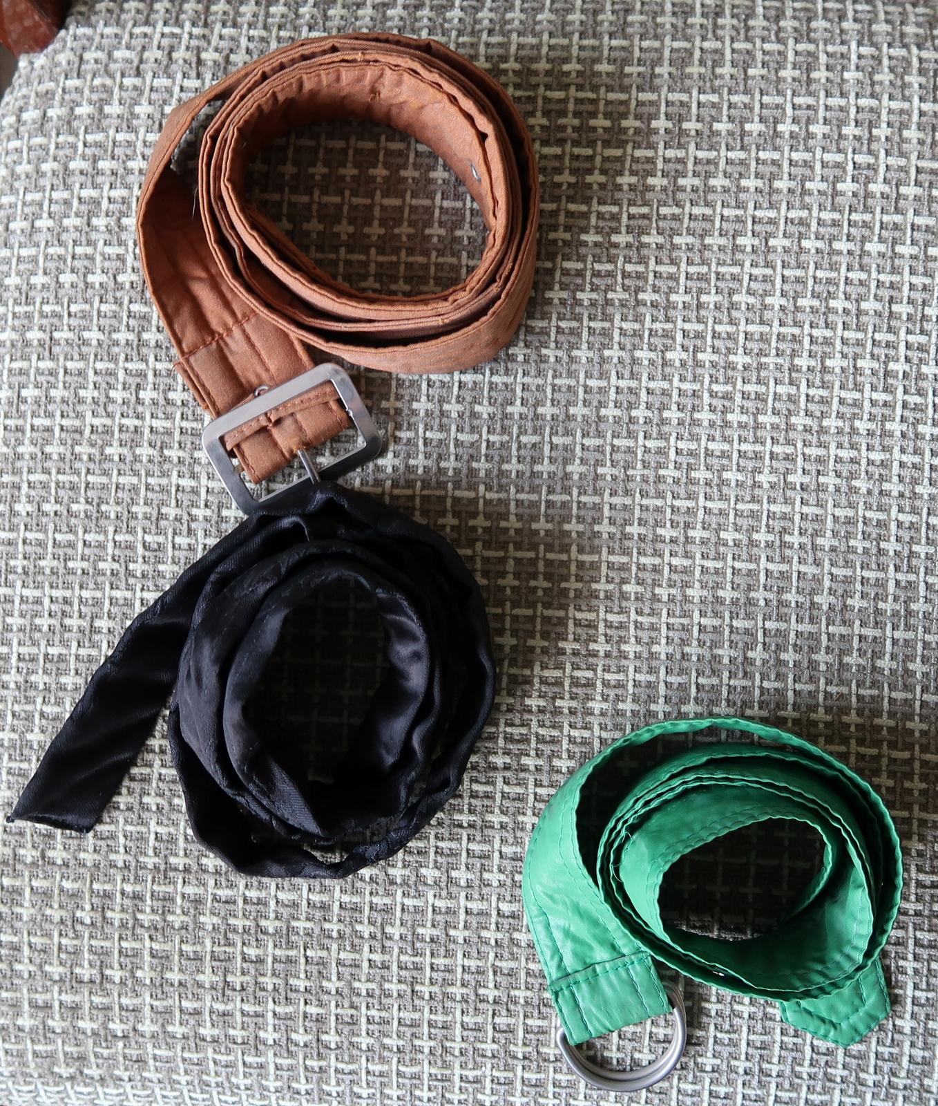Step into the world of vintage elegance with this exquisite set of 3 belts from the USSR, crafted with cotton and silk materials that exude sophistication and style from the 1970s. These belts are a true treasure, each one showcasing its unique