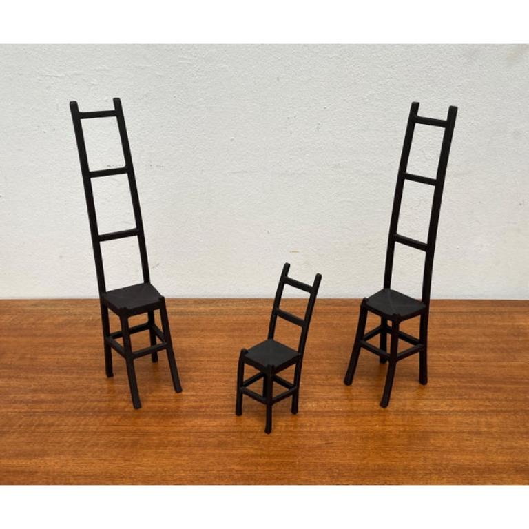 Vintage Cast Iron Chair Art Sculptures, Set of 3, in Very Good conditions. Designed 1980 to 1989.

Additional information:
Material: Metal
Color: Black
Item Type: Vintage, Antique or Pre-owned
Diamension: 3.15ʺW × 3.94ʺD × 14.96ʺH
Condition: Some