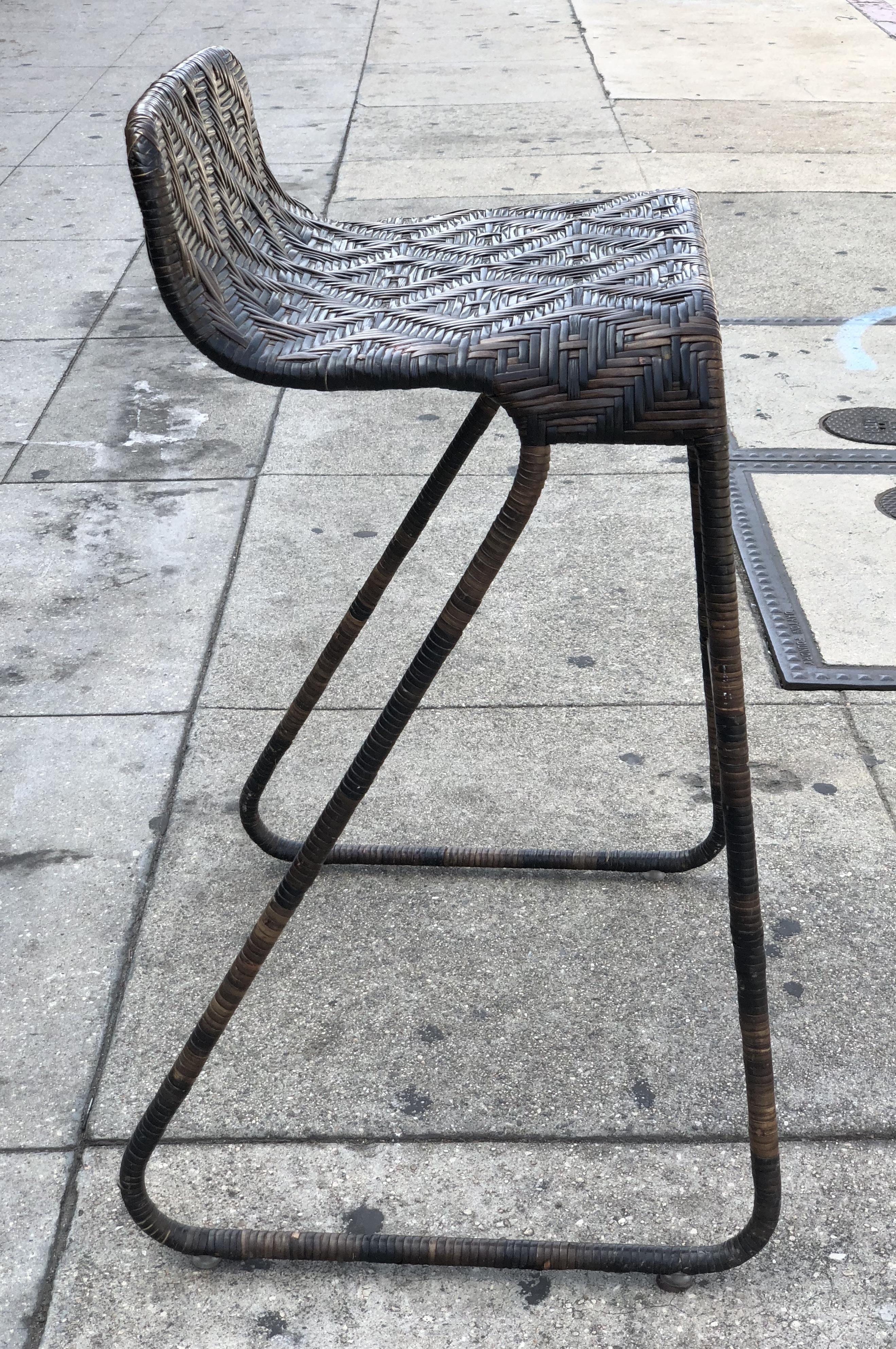 Unique and beautiful set of 3 counter stools with woven wicker embossed frames, the pieces are in good vintage condition with minor wear and only with a few nicks and scrapes to the metal and material.
Measurements:
31