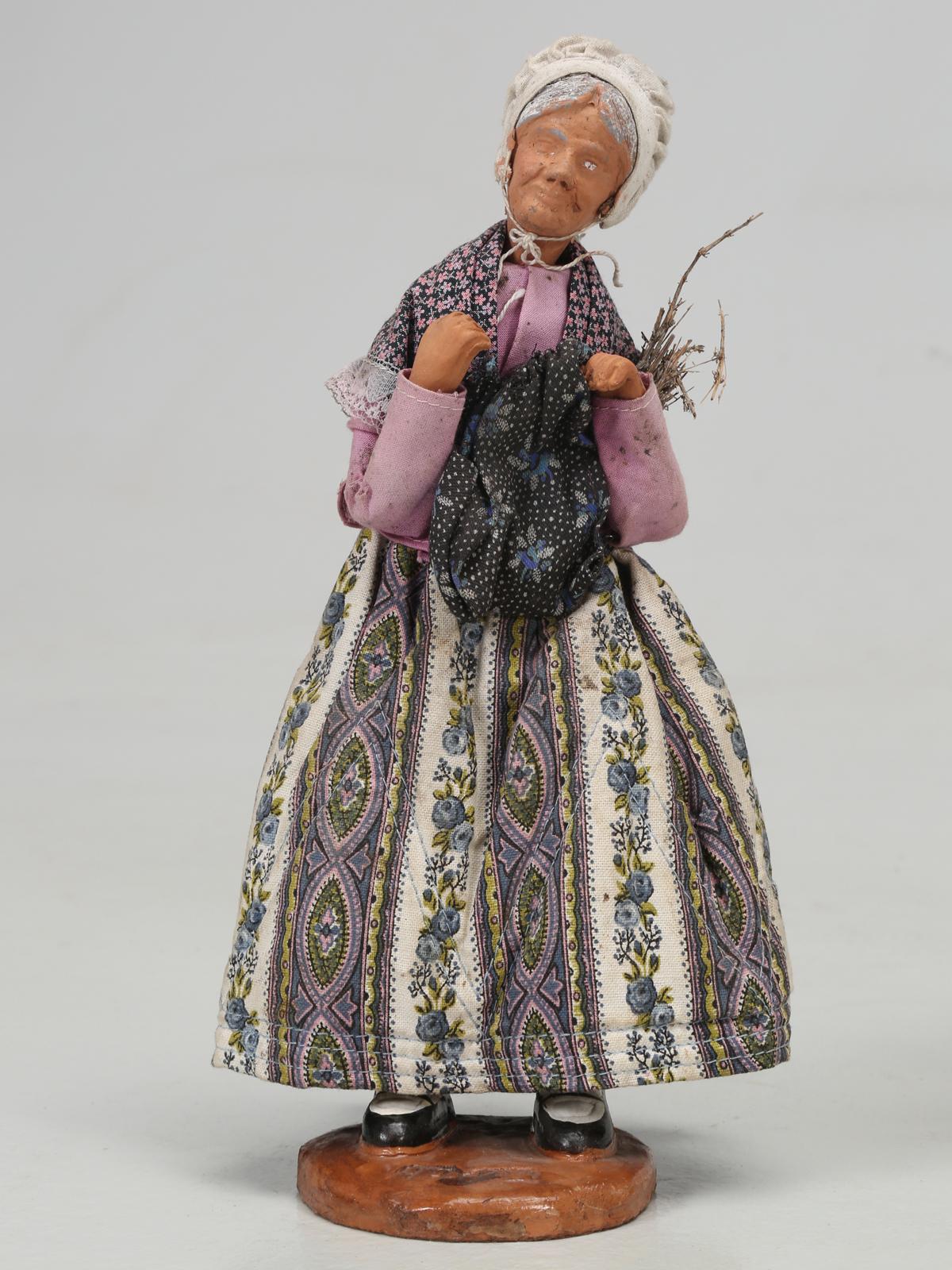 Santons are hand painted, terracotta nativity scene doll like figurines, from southeastern France. There are about 55 different people, from various characters in the typical Provençal village. Santons were first created by the artist Lagnel