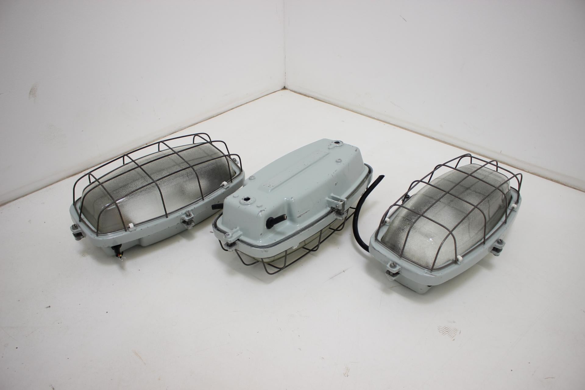 Set of 3 vintage Industrial Ceiling Lamps Typ 511 32 01, made in Czechoslovakia, in the 1960's.
Made of metal and glass.
Repolished, cleaned, shows signs of use.
Fully functional.