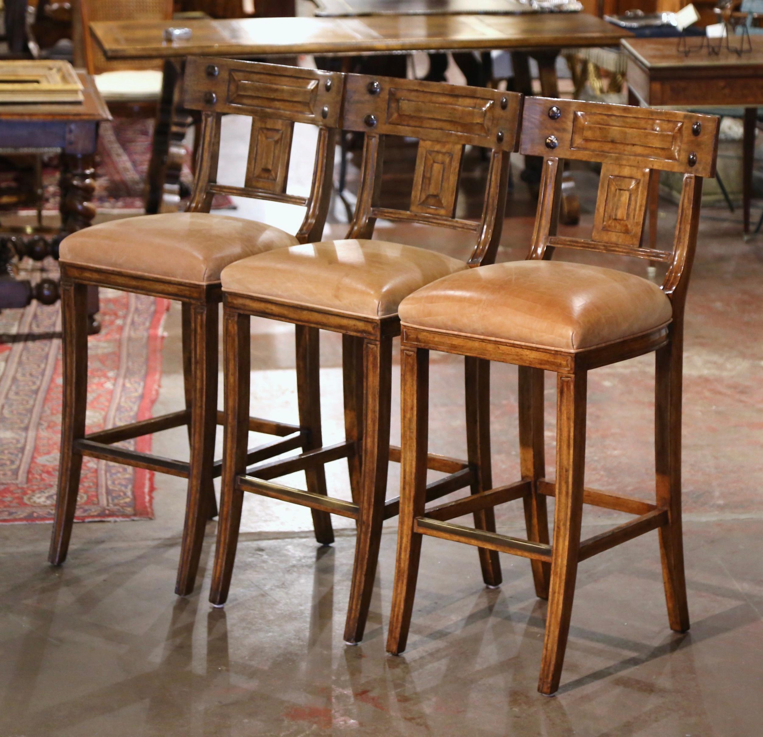 Set of 3 Vintage Michael Taylor Tan Leather Seat Carved Walnut Bar Stools In Excellent Condition In Dallas, TX
