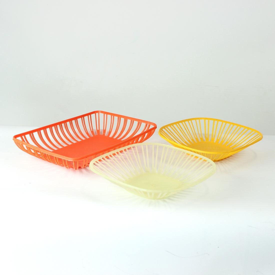 Great vintage kitchen baskets, or serving baskets. Produced in the best of the plastic era of 1960s. The typical mid-century vibe just oozes through these great baskets. They are in nearly perfect condition and fully functional. Produced in
