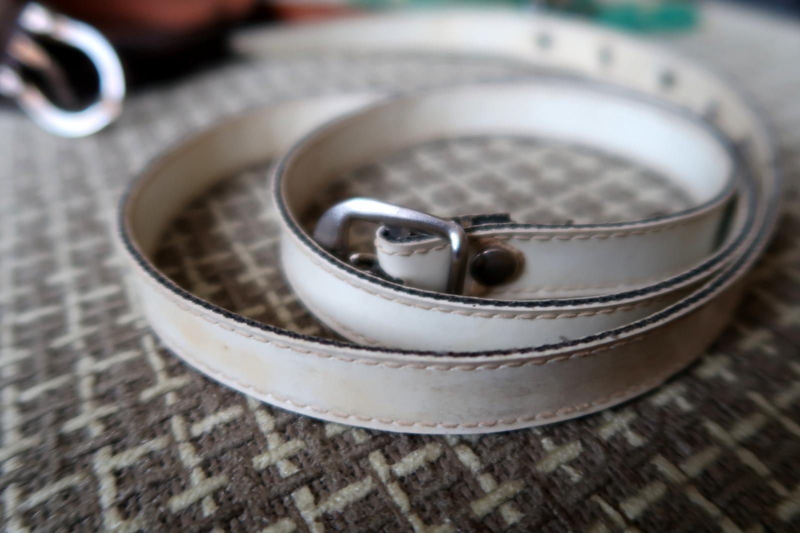 Step into the world of vintage elegance with this exquisite set of 3 thin leather belts from the USSR, crafted with sophistication and style that transcends fashion eras. Dating back to the 1970s, these belts are a true treasure, each one showcasing