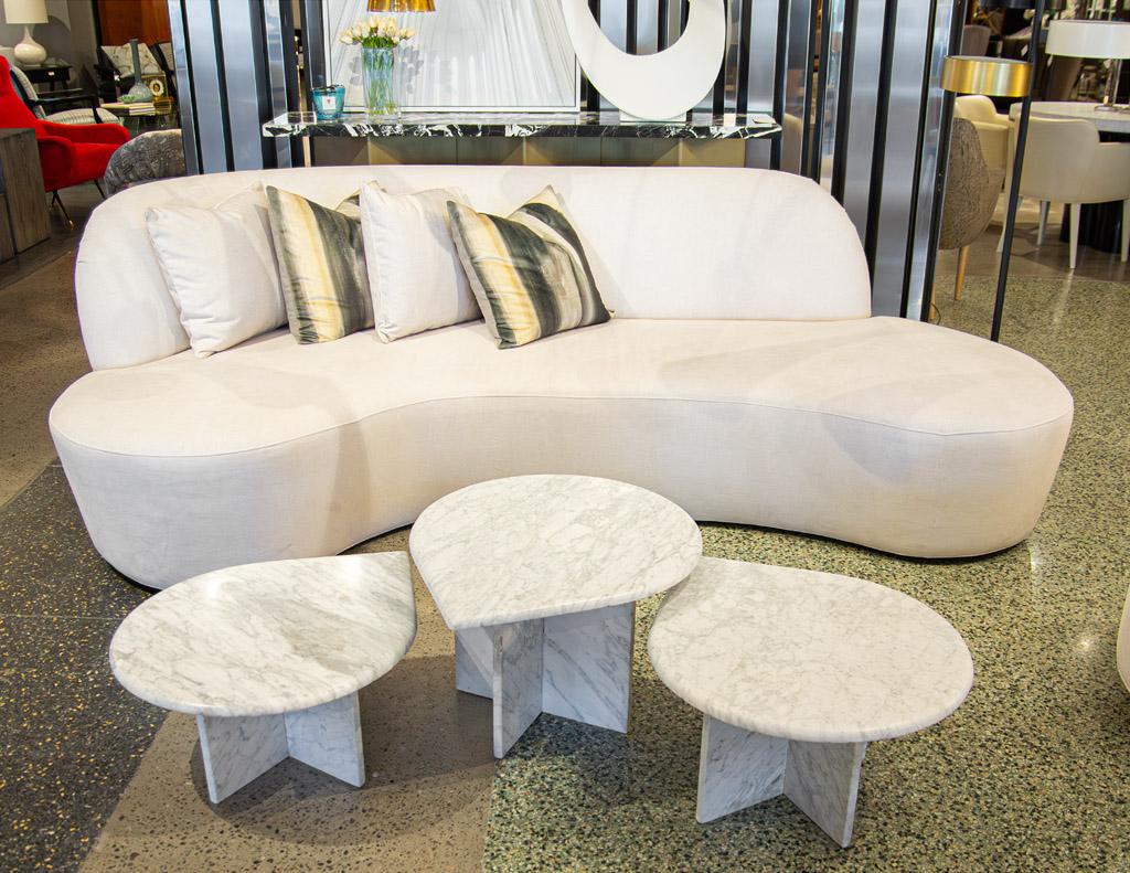 This beautiful set of 3 travertine accent tables is a perfect addition to any living room. Crafted in Italy during the 1970's, these tables have tear drop shaped designs with beautiful, detailed travertine stone featuring a mixture of white and grey