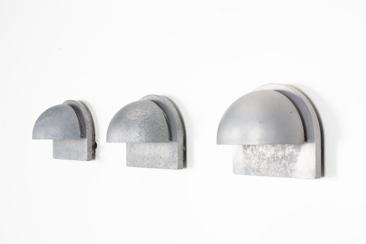 Set of 3 wall lamps designed by Alfred Homann for Louis Poulsen in the 80s (stamp inside, see picture)
Danish design
All in cast aluminum, matte finish
iconic pieces

Bulbs sold with the lamps