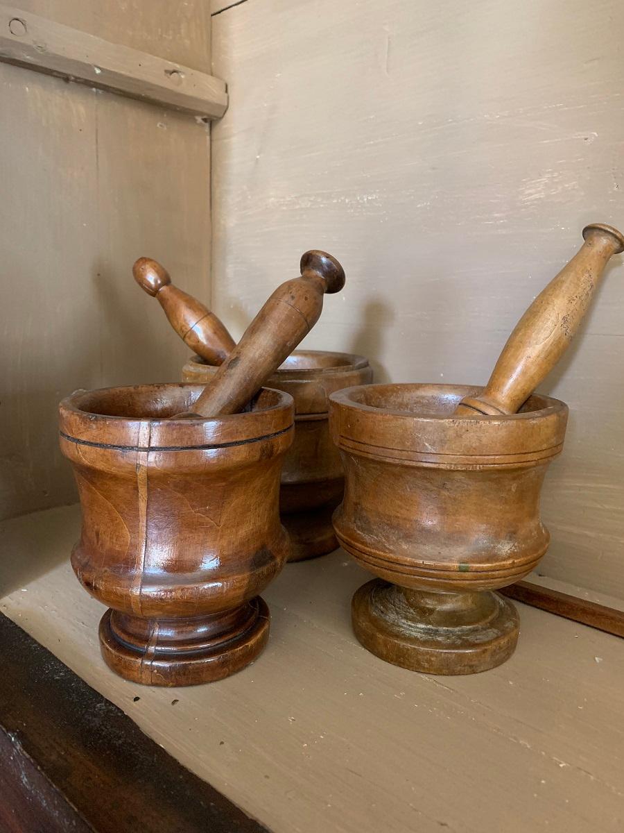 A set of 3 French 19th century walnut mortars with their pestles. Great shape, colour and patine.