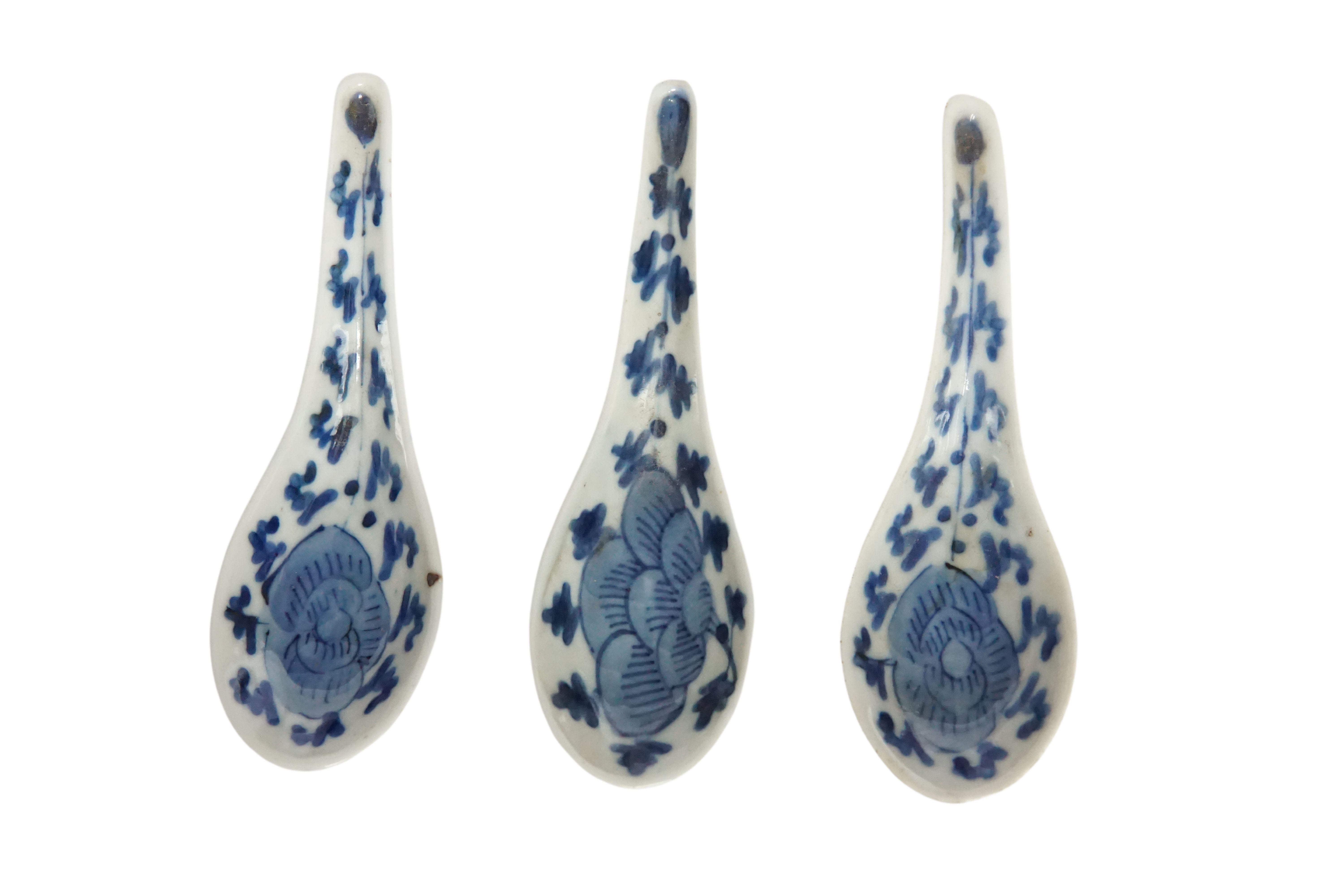 A set of 3 wonderfully hand-painted Chinese blue & white ceramic spoons circa 1850. They bear a floral pattern design and beautiful, sculptural shape. A great piece of Chinese History. 
 