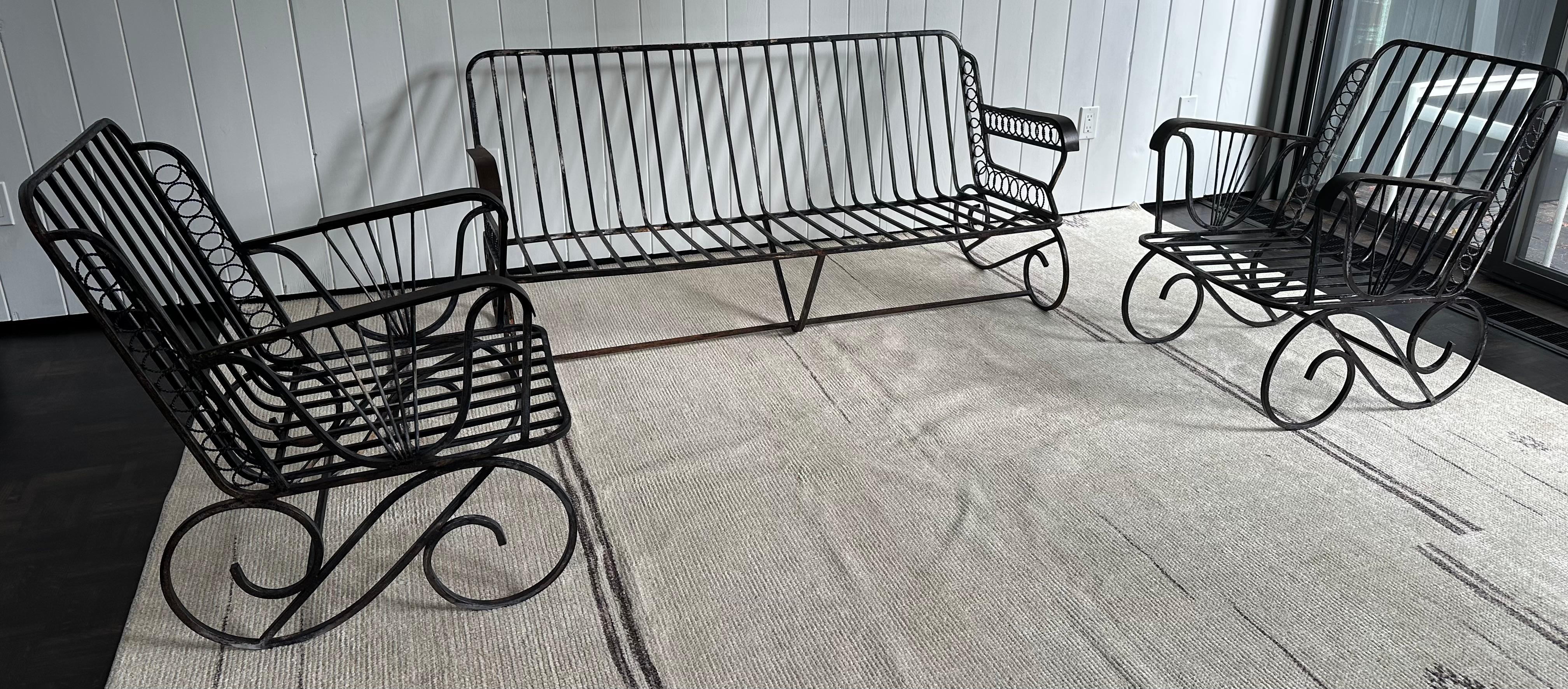 Mid Century Modern Set of 3 Wrought Iron sofa & two chairs Garden Furniture Set. This set has unusual classic deco style circle motif, both modern and stylish.  Sofa and chairs have comfortable bent metal arm rests.  Well proportioned with seating