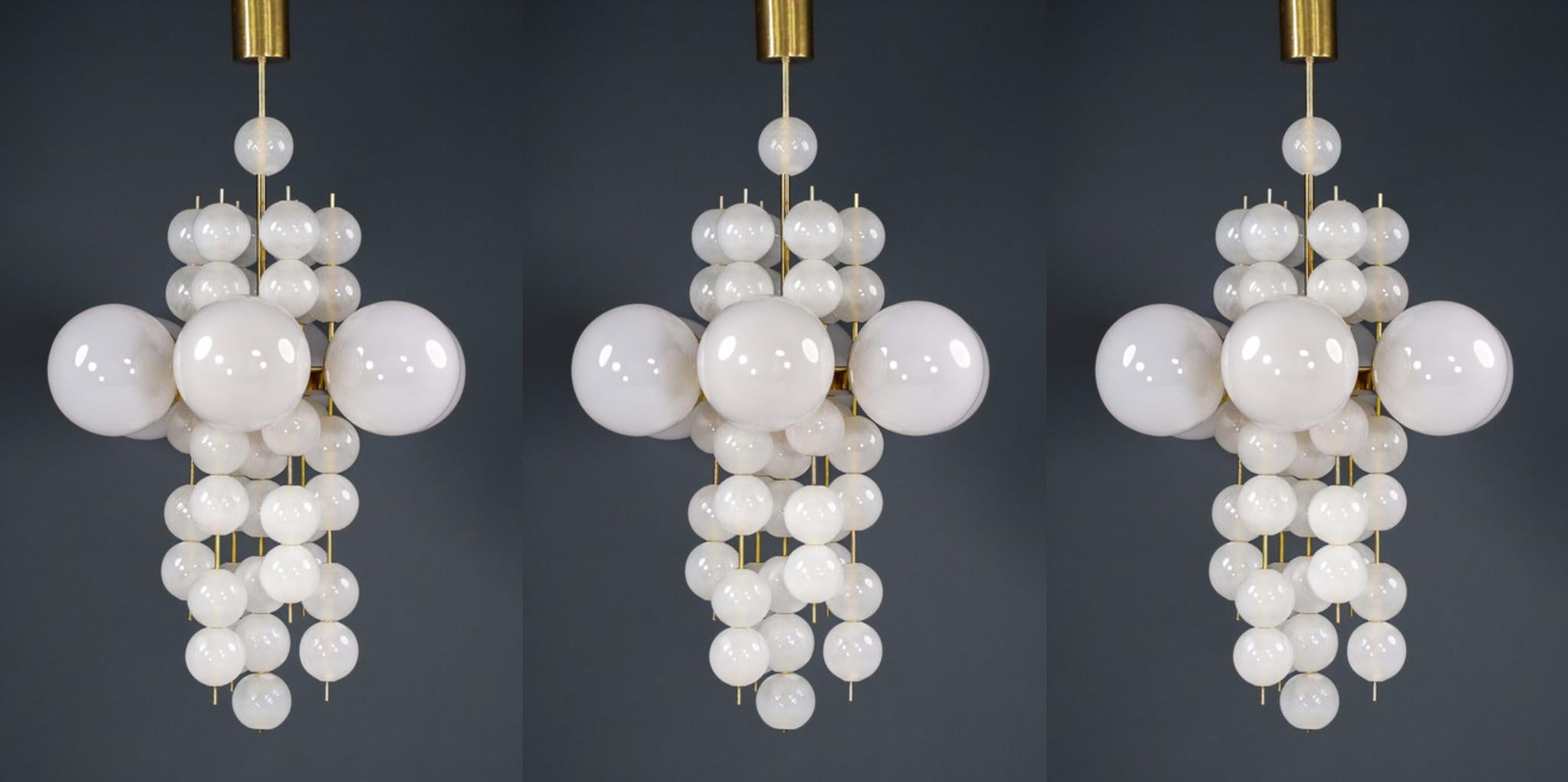 Set of 3 XL hotel chandeliers with brass fixture and hand-blowed frosted glass globes by Preciosa, Czechia.

Large hotel chandelier with brass fixture produced and designed in Czechia by the famous Preciosa Factory. Total 6 large hand blowed frosted