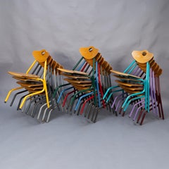 Set of 35 Multi-Coloured Stacking Tubular & Plywood Chairs by NF Mobilier France