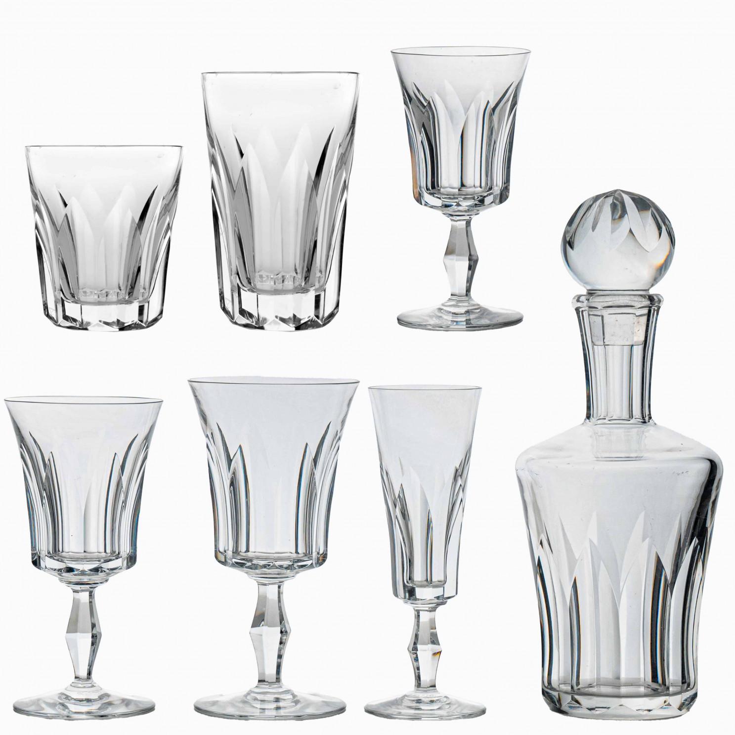 Luxury at its finest, set of 24 high-end drink glasses in clear crystal and 1 decanter by Baccarat.

The Polignac glassware showcases Baccarat’s meticulous craftsmanship. Deep orgue bevel cuts are etched directly into the Clear crystal, radiating