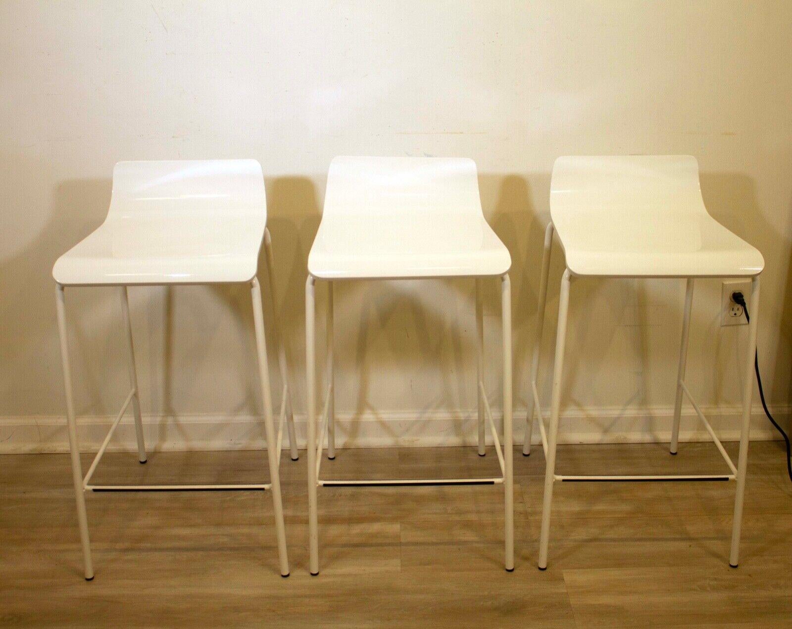 white leather bar stools with gold legs