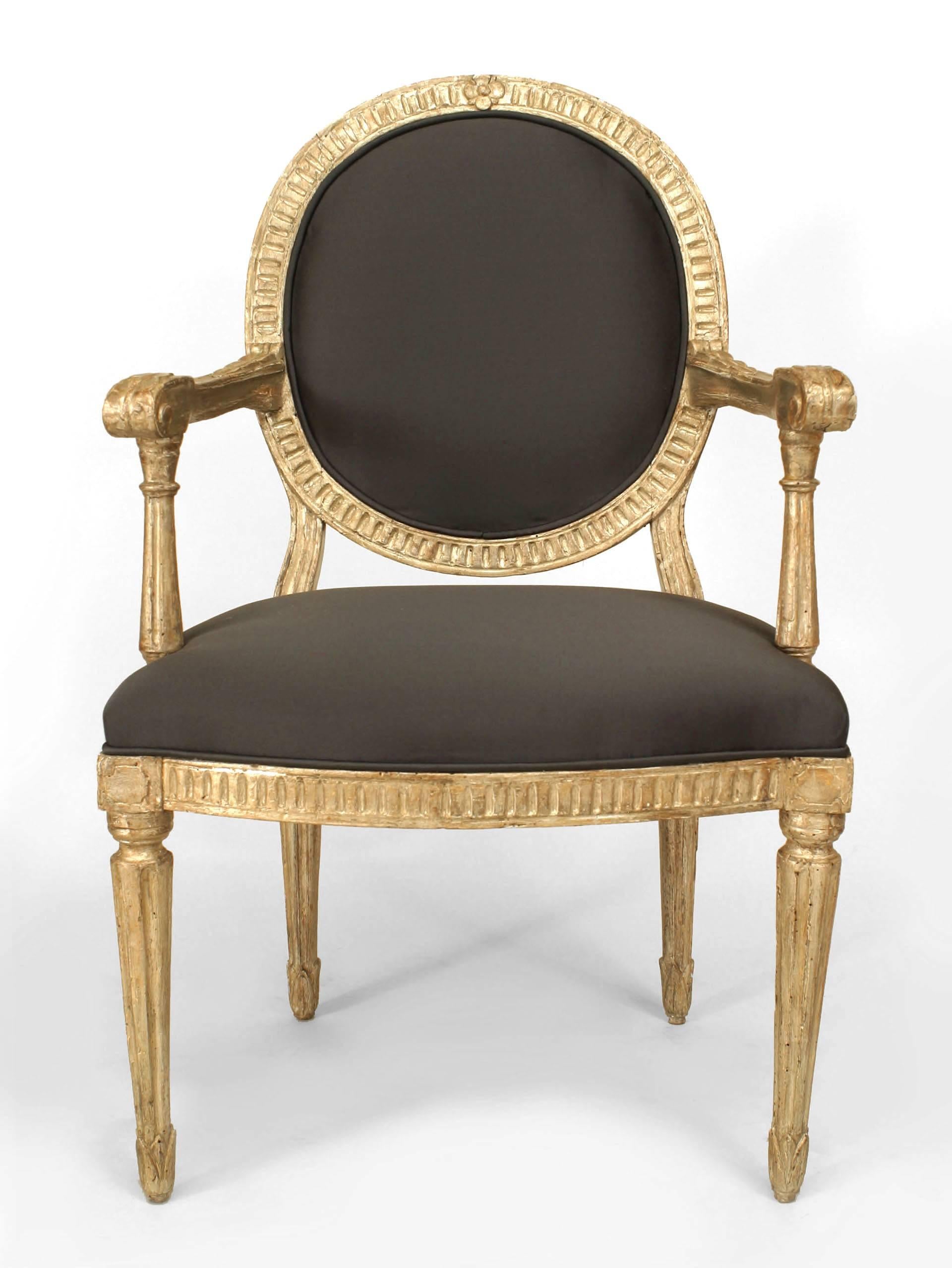 Set of 4 Italian Neo-classic (18th Cent) silver gilt arm chairs with carved fluted design oval back, seat rail and legs with upholstered seat & back.

