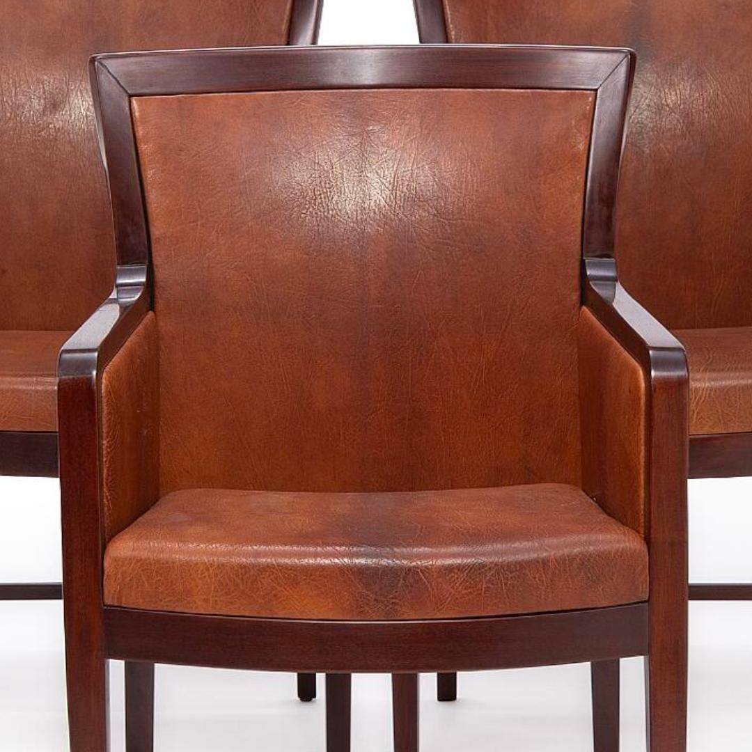 Set of four 1930s Kaj Gottlob solid mahogany armchairs. Seat, sides and back upholstered with Niger leather. Made by Rud Rasmussen Cabinetmakers. Made to order for the Copenhagen Stock Exchange building.
