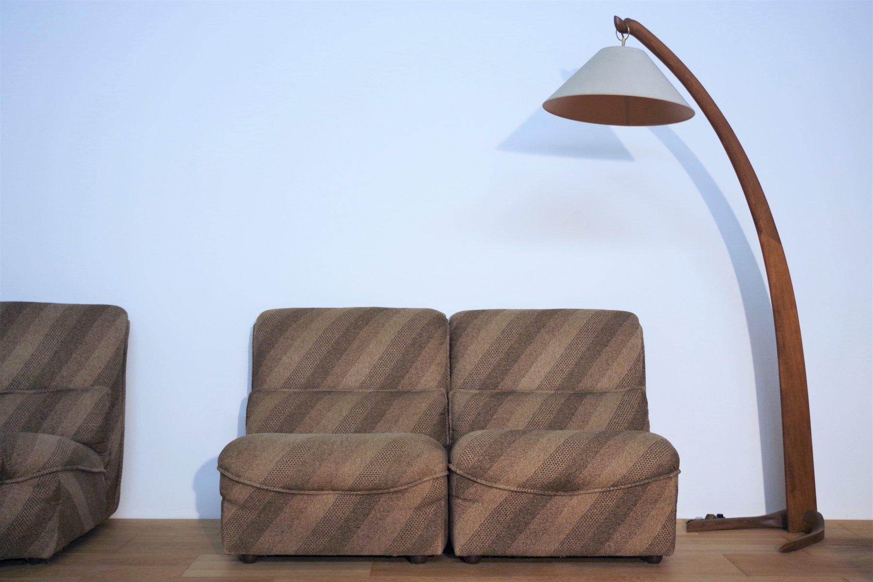 Set of 4 1950s Armchairs with Corner Element in Striped Fabric - Mid-Century Elegance

Add a touch of mid-century sophistication to your living space with this exceptional set of four armchairs accompanied by a versatile corner element. Crafted in