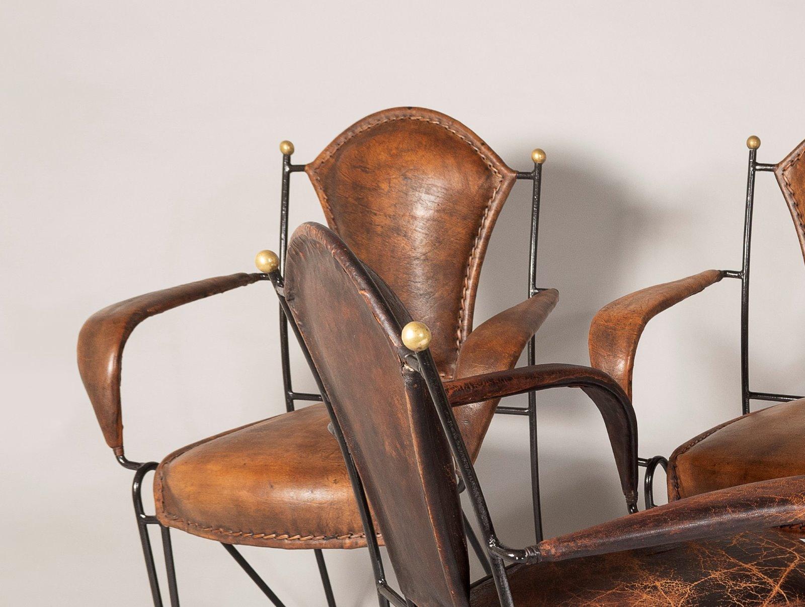 Conjunto de 4 sillones franceses Jacques Adnet de los años 50, con estructura de hierro y cuero cosido en venta 7