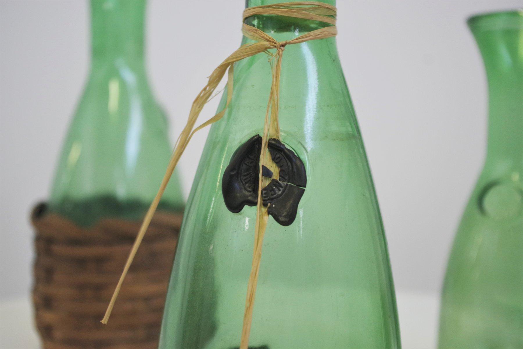 Mid-20th Century Set of 4 1950s Green Glass Decanters with Straw - Rustic Charm For Sale