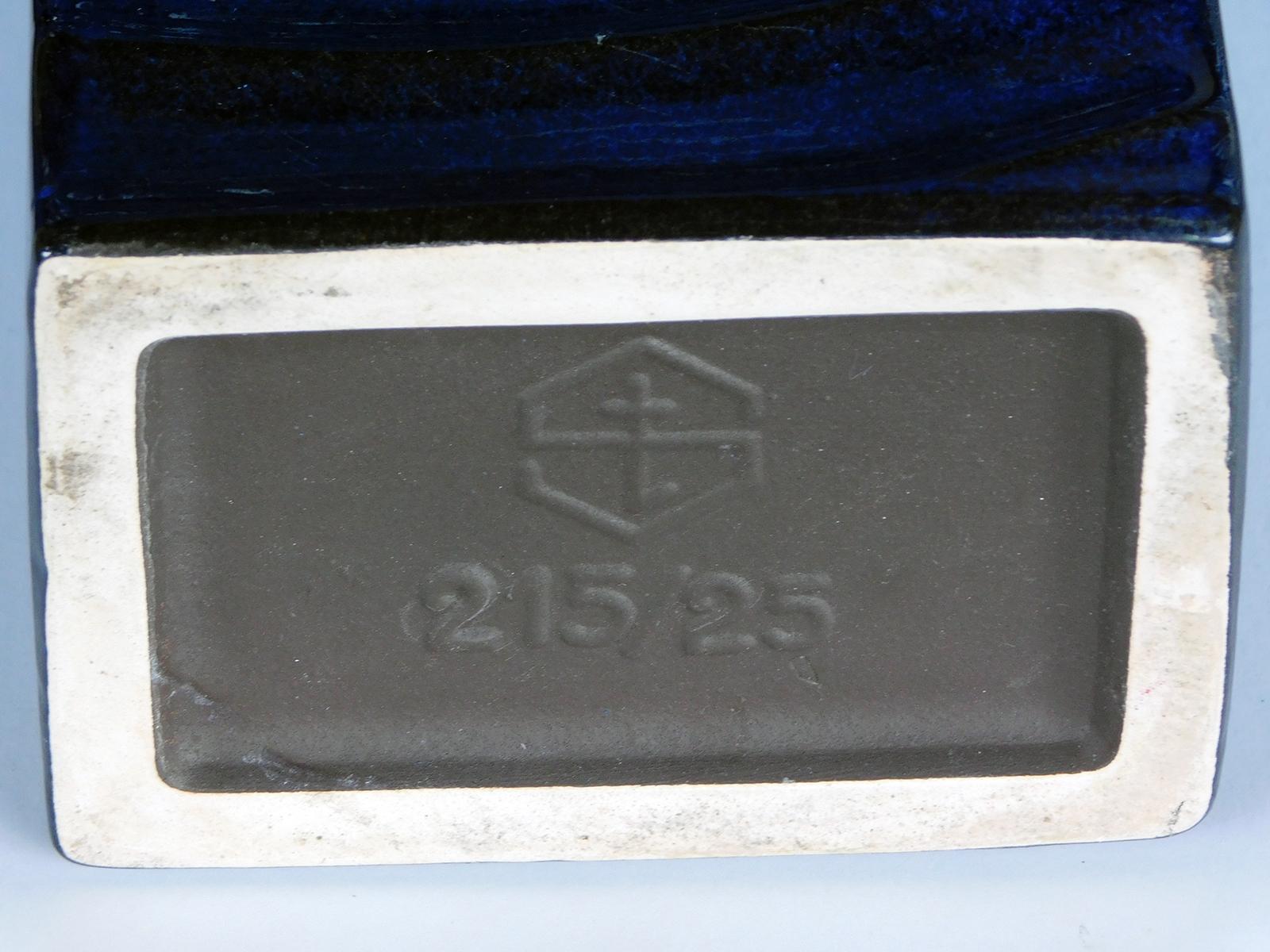 Each of rectangular form with raised offset concentric rings or 'ripples' all in a deep blue on black glaze; STEULER was founded in Höhr-Grenzhausen, a center of the ceramic industry in the Rhineland's Kannenbäckerland, in 1917.  STEULER reached its