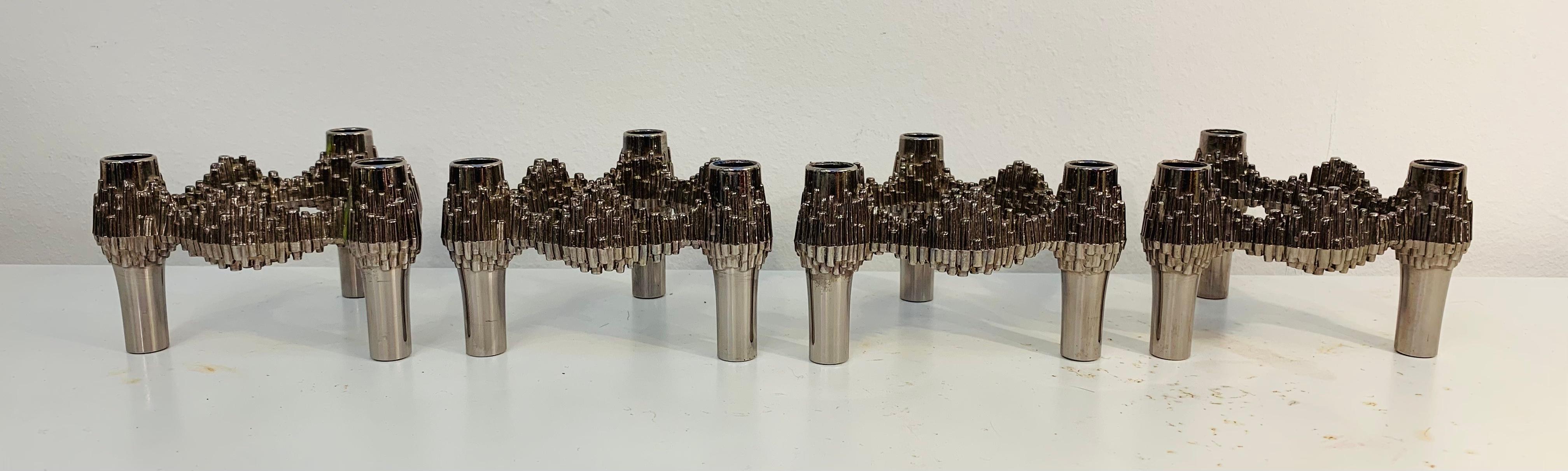 1960s German 'Variomaster' stackable modular candle holders that can be configured in a multitude of different ways and added to at your whim. Manufactured by Quist Präsente. The price is for all four. In very good vintage condition. All four match