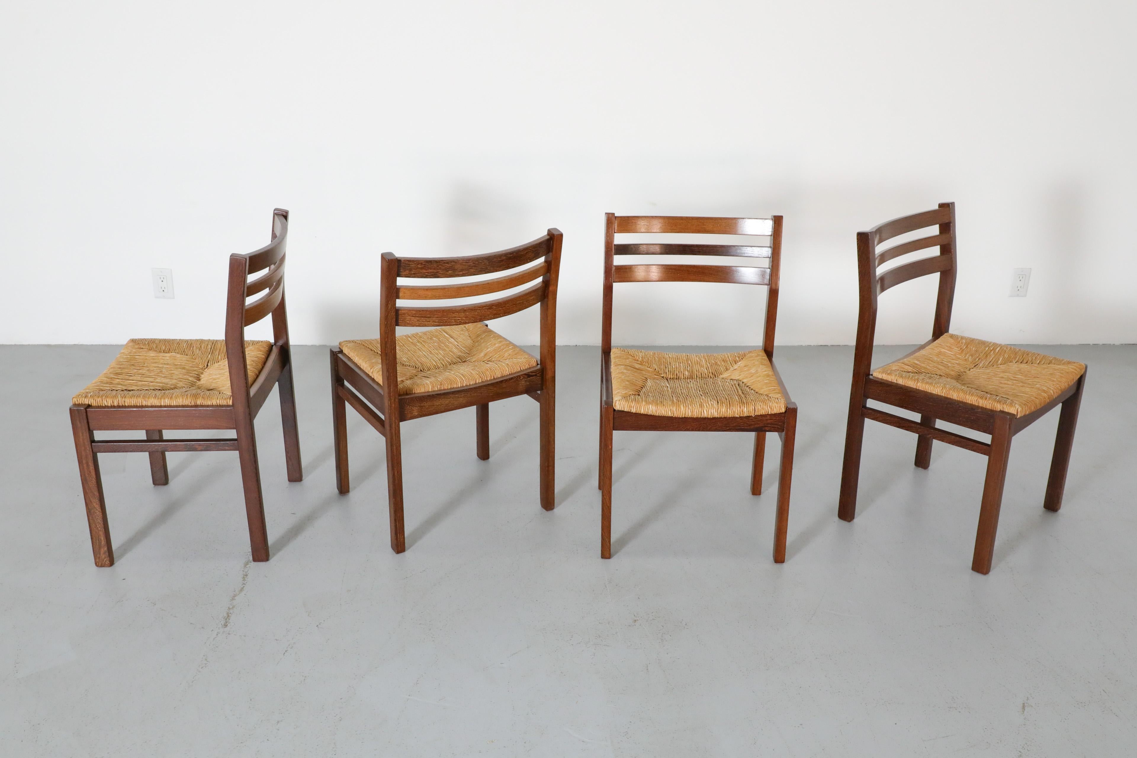 Mid-Century moderno Set di quattro sedie da pranzo in wengé e giunco di Martin Visser degli anni '60 per 't Spectrum in vendita