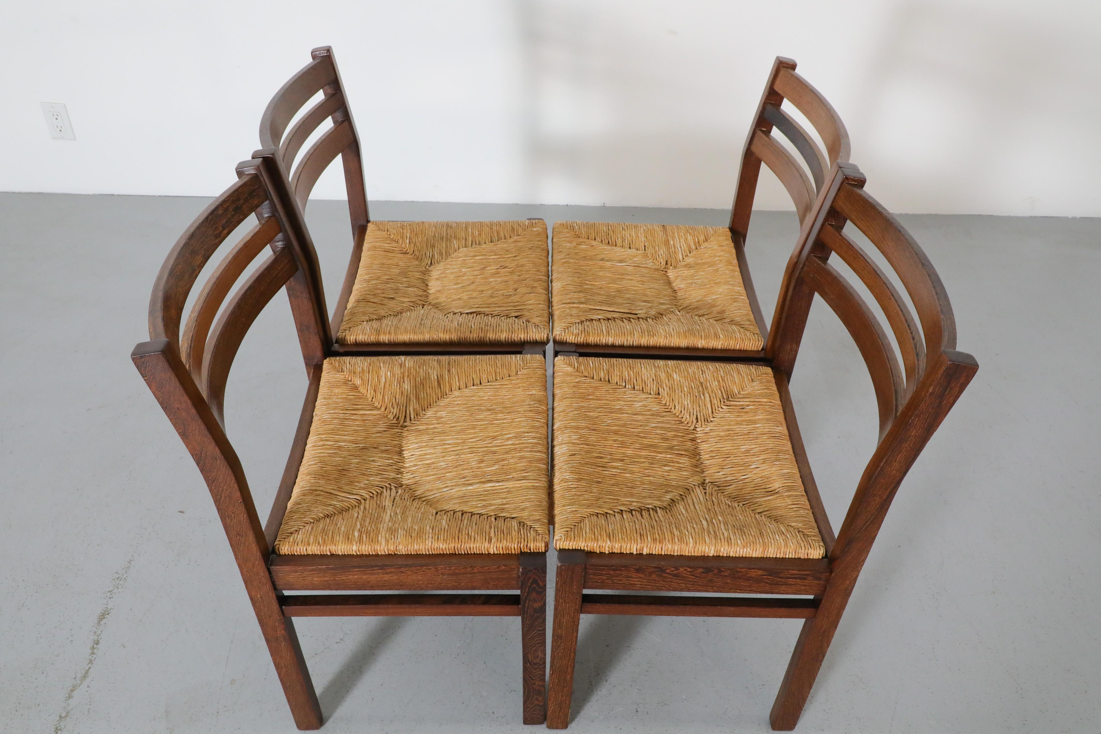 Olandese Set di quattro sedie da pranzo in wengé e giunco di Martin Visser degli anni '60 per 't Spectrum in vendita