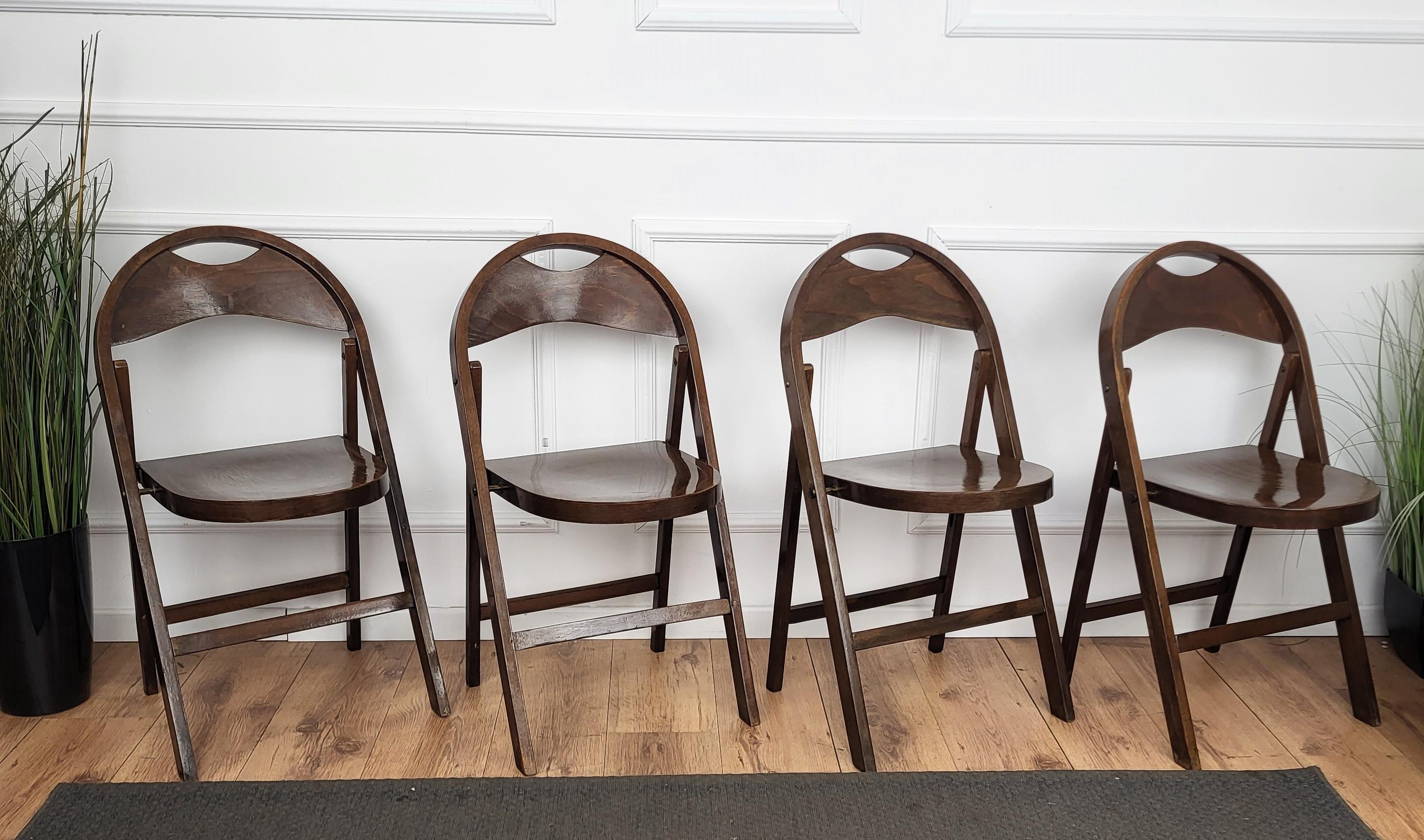 I offer a set of four folding chairs model B751 designed at the beginning of the 20th century by Thonet, manufactured in the early 1960s at the Thonet factory in Radomsko (central Poland). They were rarely used in a conferencial hall in one of the