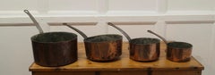 Set of 4 19th Century Copper Pots   Set of 4 well loved and well used copper pot