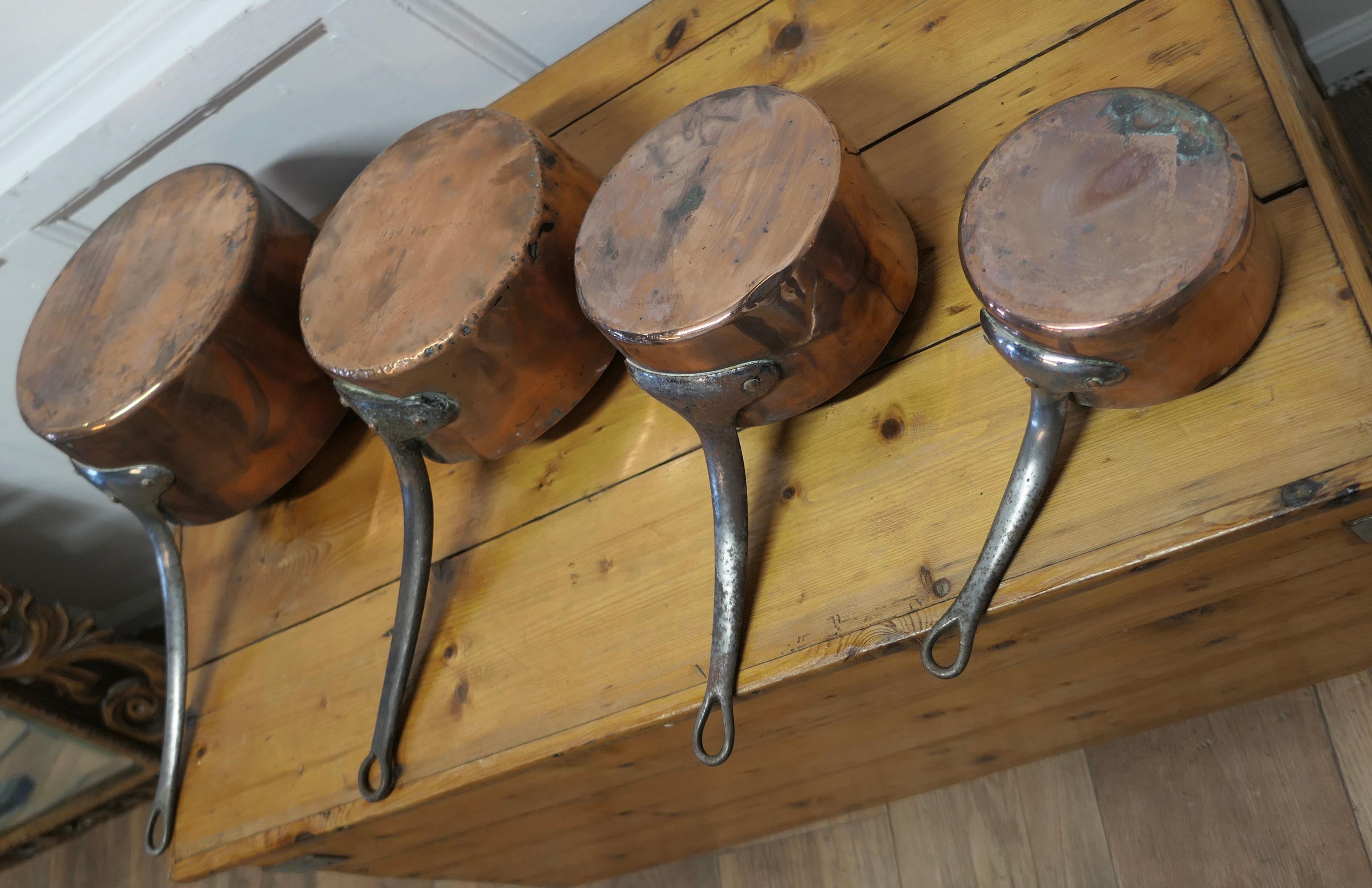 Set of 4 19th Century Copper Pots   Set of 4 well loved and well used copper pot For Sale 1
