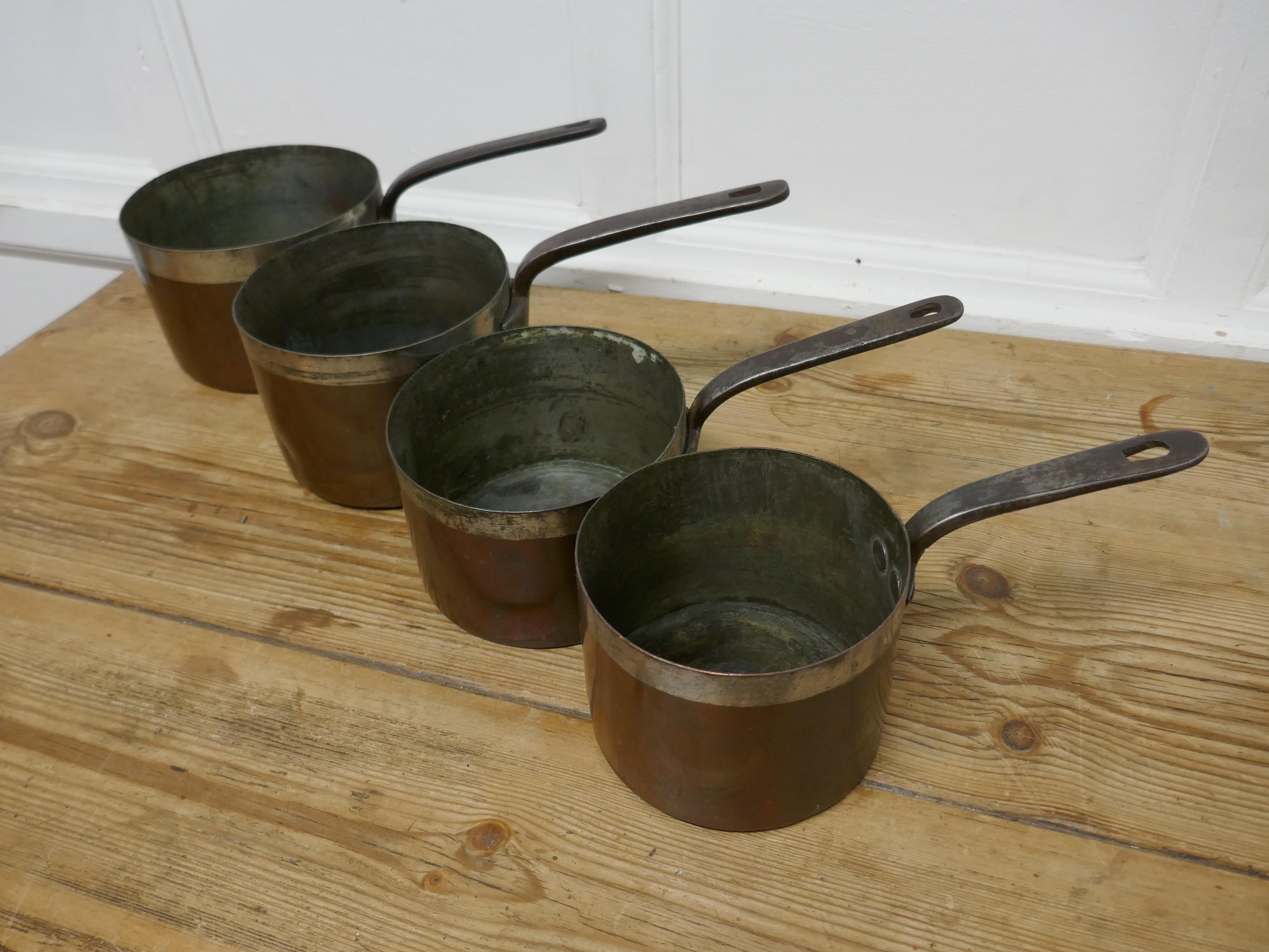 Set of 4 19th century Scottish tinned copper pots by James Grayson


Set of 4, 19th century Scottish copper pots by James Grayson of Edinburgh, the pots are tinned inside an around the top rim, they have cast Iron handles one has the letter ’T’