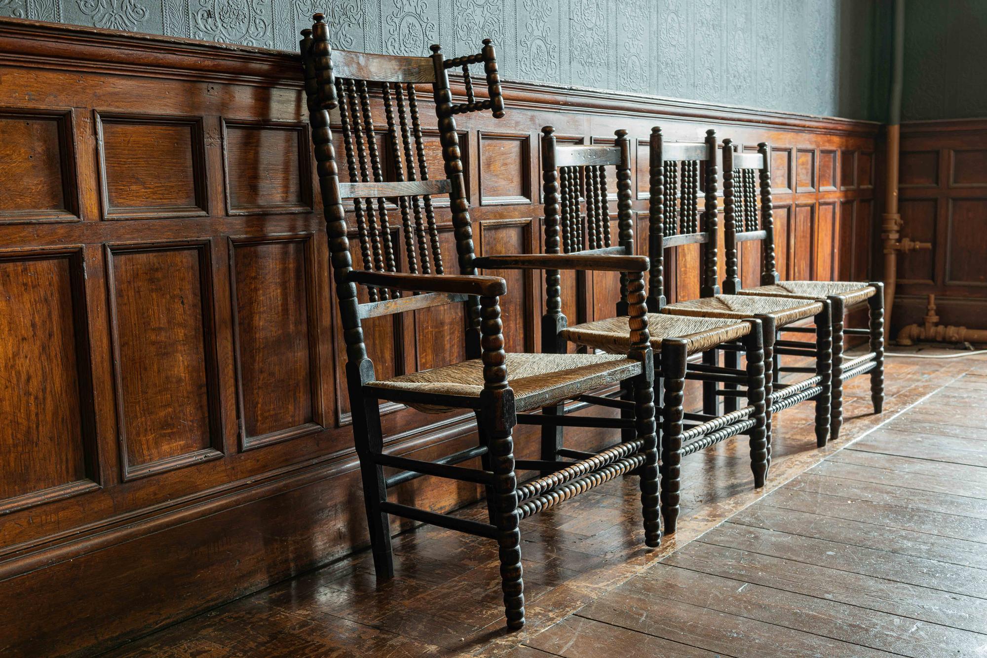 Set of 4 19th century English oak ebonized bobbin chairs,
circa 1880.

Ebonized English oak wool winder Bobbin armchair/carver with rush seat.
Measures: 113 H x 57 W x 42 D
(Seat height 42cm)

Ebonized English oak X3 bobbin chairs with rush