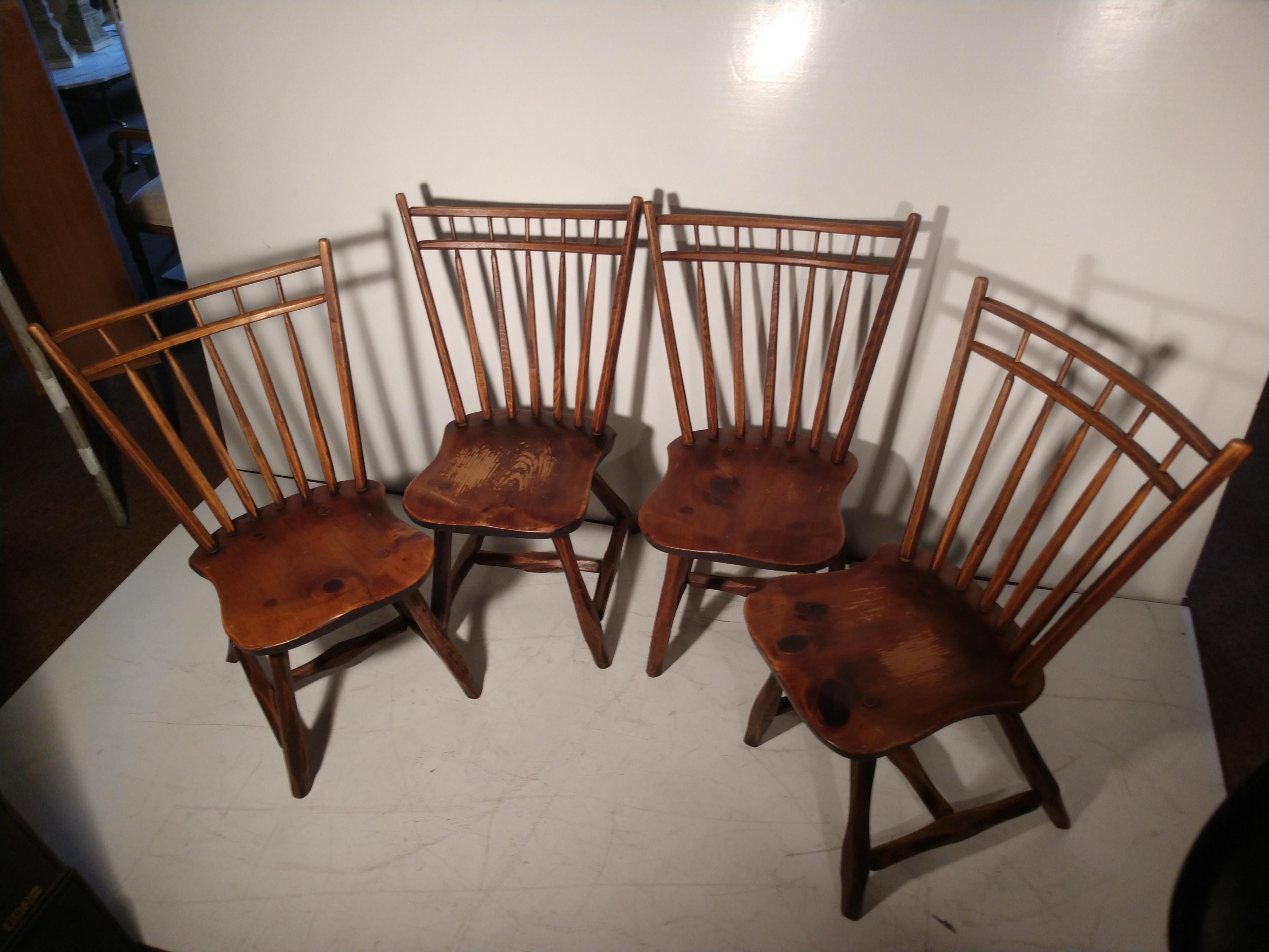 Fabulous set of 4 handmade Adirondack Camp style Hickory chairs with pine seats. Styled after a Windsor chair, these chairs are all unique being that they are totally handmade. Very tight and sturdy, they come with wool seat cushions. They would be