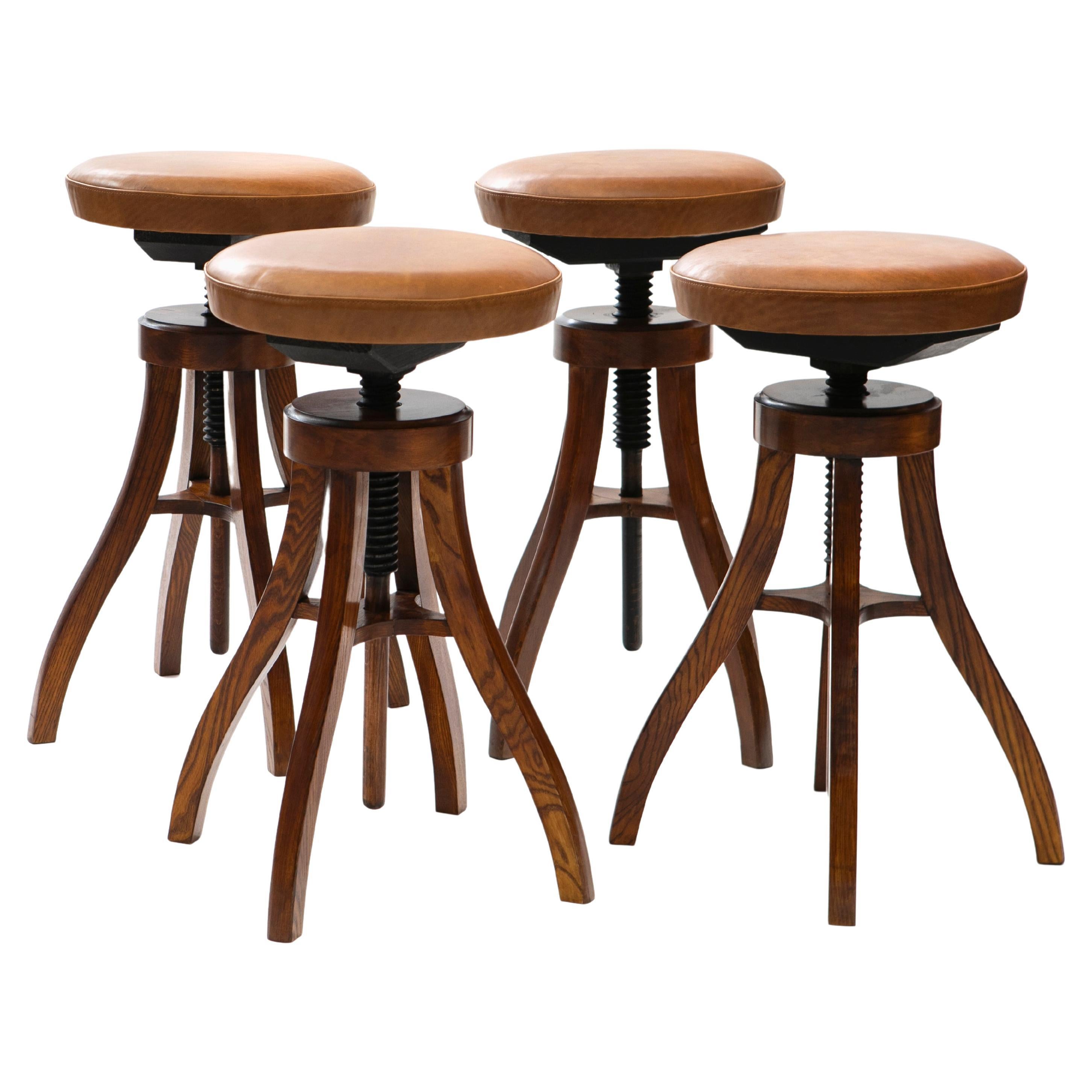 Set of 4 adjustable Bar Stools In Oak & Leather - Fritz Hansen For Sale