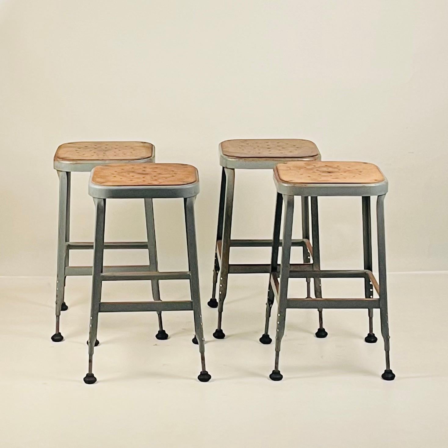 Set of 4 Adjustable Patinated Steel Counter Stools by Lyon Manufacturing For Sale 2