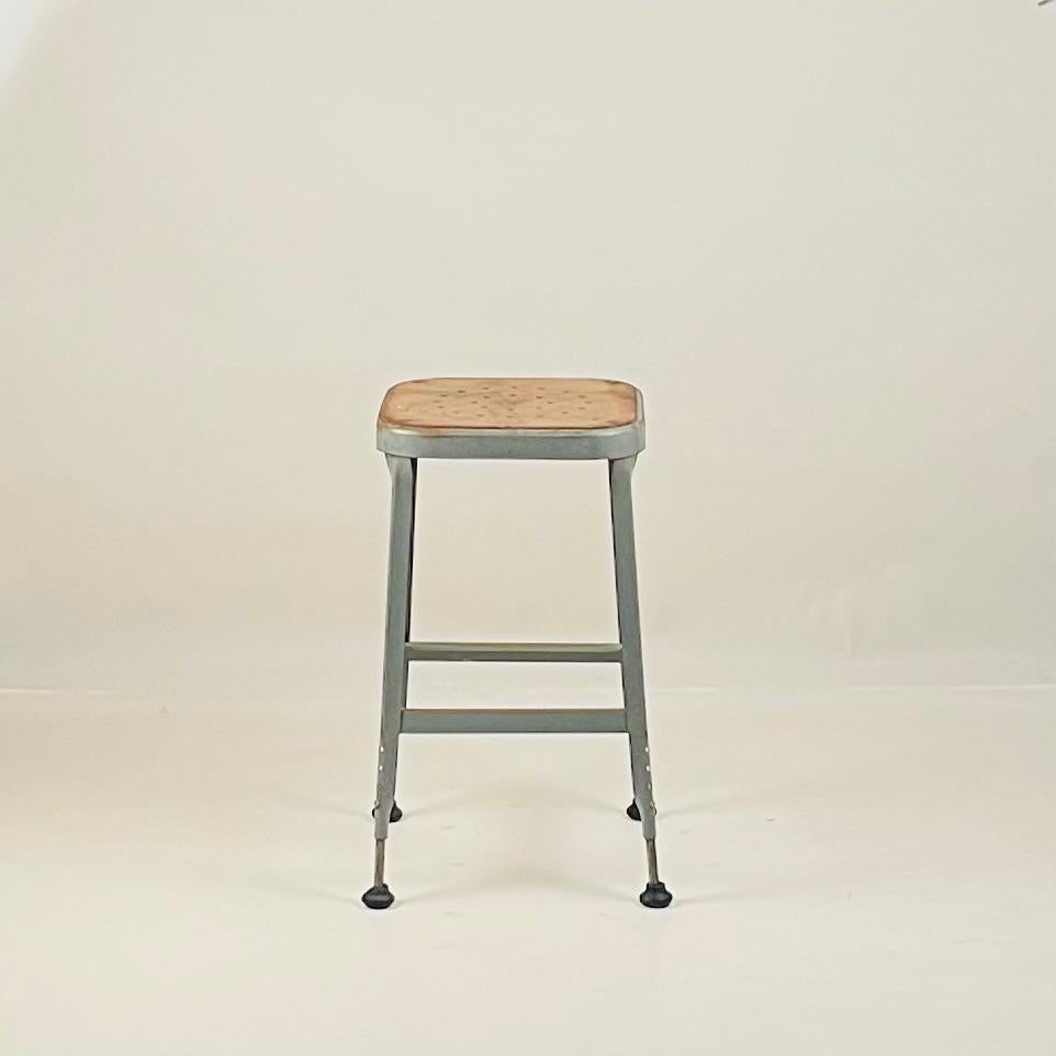 Industrial Set of 4 Adjustable Patinated Steel Counter Stools by Lyon Manufacturing For Sale