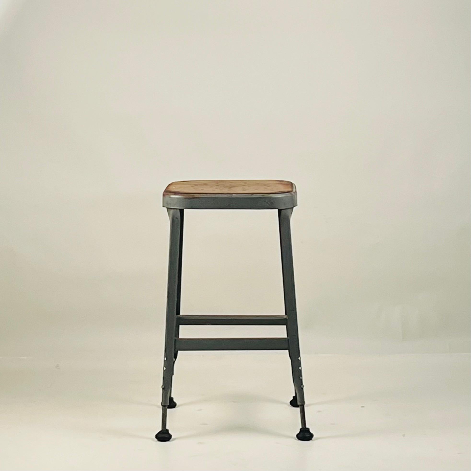 American Set of 4 Adjustable Patinated Steel Counter Stools by Lyon Manufacturing For Sale